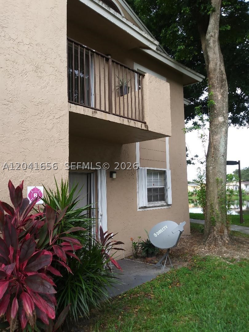Condo in the heart of Pembroke Pines! This charming 2-bedroom, 2-bathroom unit on the second floor with open balcony and storage closet you can see the lake for those quiet nights. A cozy atmosphere and a convenient split bedroom layout for added privacy. Enjoy the comfort of all-tile flooring with water included . Inside, you'll find a washer/dryer for your convenience. The community of REFLECTIONS offers a swimming pool. Centrally located with easy access to major expressways and shopping areas, this property offers the perfect blend of convenience and tranquility in a quiet community setting. Freshly Painted and updated kitchen.