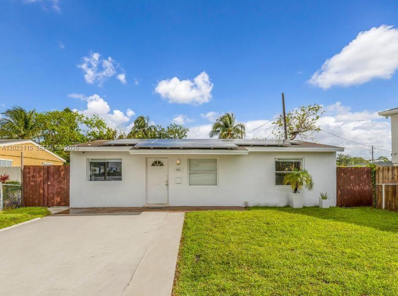 Well-maintained property reflecting true pride of ownership. Gorgeous, bright, and spacious 2-bedroom, 1-bath home plus a den, along with an additional fully enclosed room with A/C located in the patio area, offering flexible use as an office, gym, or guest space. Solar panels convey with the sale, generating substantial monthly utility savings. Situated on a large 7,085 SF lot with a beautifully upgraded outdoor area featuring a shaded pergola and BBQ area, ideal for entertaining and family enjoyment. An additional full bathroom and laundry area add functionality and versatility. New wood fence and patio side doors. The owner, a contractor, has invested heavily in property maintenance, including sewer improvements and a complete patio transformation. Features include newer stainless steel appliances and custom-made closets. No open permits. Roof and A/C are in good condition. Easy to show.