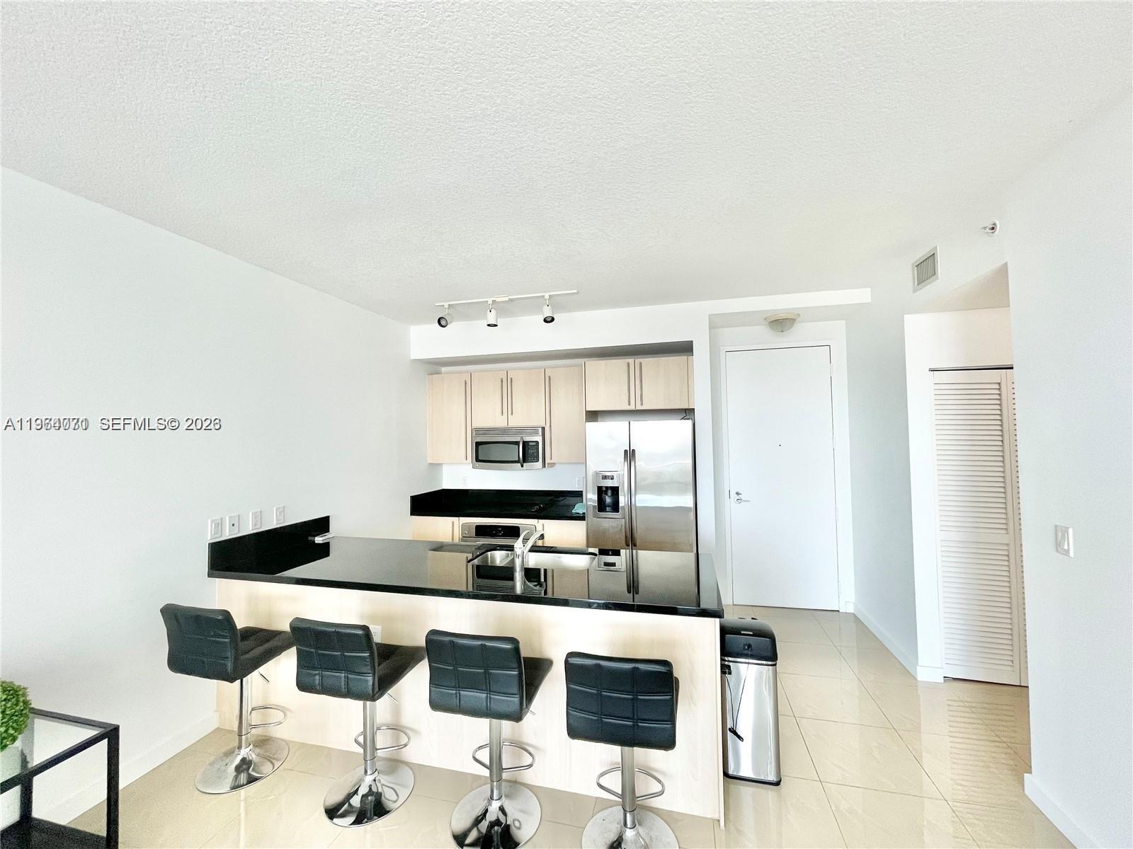THE AXIS ON BRICKELL COND - Residential Lease