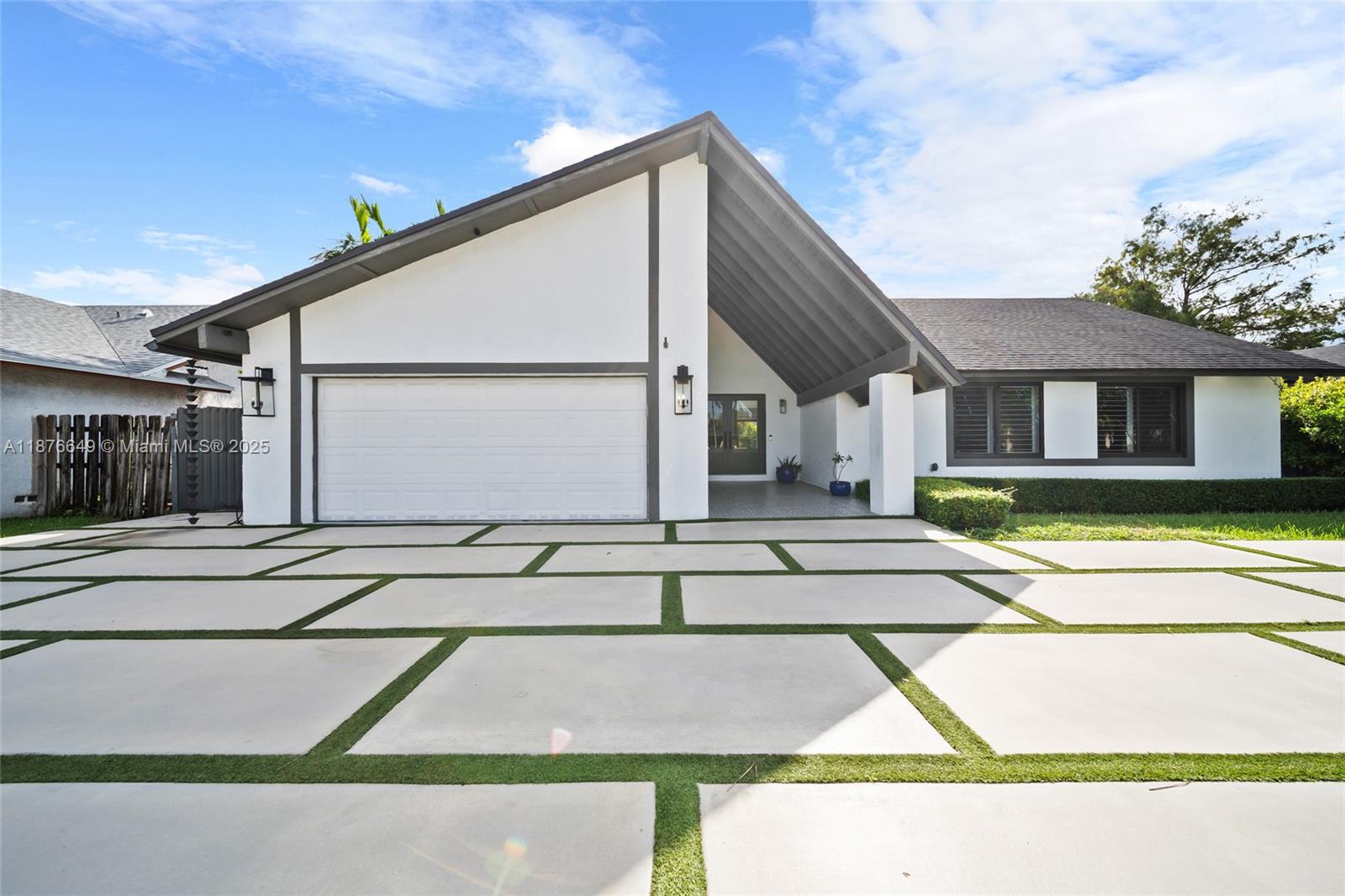 Updated & Modern 3-bedroom, 2-bath pool home in the Calusa community. This sunny residence features a new roof, and impact windows and doors, tile flooring throughout, recessed lighting, and an open-concept kitchen with quartz countertops, a marble-covered island, and stainless-steel appliances. A convenient updated garage houses the washer and dryer. Perfect for comfortable living and entertaining. Please contact Gus Reyes for all showing request and questions. SEE BROKER'S REMARKS