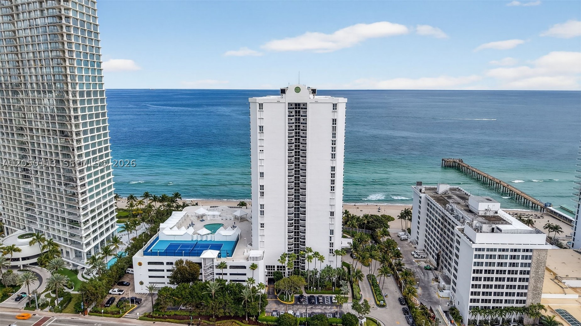 Experience refined coastal living in this stunning, fully remodeled oceanfront residence located in the heart of Sunny Isles Beach. This beautiful 3 bedroom 3 bath unit has been thoughtfully redesigned to blend modern elegance with timeless comfort. Sleek gray ceramic flooring throughout, creating a clean, contemporary aesthetic that complements the natural light and ocean backdrop. The fully redone, upgraded kitchen boasts high-end finishes and appliances and modern cabinetry, perfect for both everyday living and entertaining. All bathrooms have been finished in earth tone colors, elegant tilework and appointed with modern fixtures that blend style with comfort. Offered completely furnished by Restoration Hardware. Every detail has been carefully curated to deliver a sophisticated, turnkey lifestyle. The spacious den provides added flexibility for a home office, media room, or guest space. Floor-to-ceiling impact glass windows showcase breathtaking, unobstructed ocean views, allowing you to wake up to the sound of the waves and enjoy spectacular sunrises from the comfort of your home. 2 covered parking spaces & a/c storage unit.  Sands Pointe boasts a beautiful pool and pool deck, beach service with lounges and towels, fully equipped gym, spacious party room, tennis court & is conveniently located near supermarkets, restaurants, & shopping centers. This beautiful oceanfront unit offers the perfect combination of luxury, style, and location. Unit is occupied till July 2026, 48 hours to show. Parking spaces #42 & 43 on Floor 3B. Storage locker 198 on 4th floor.