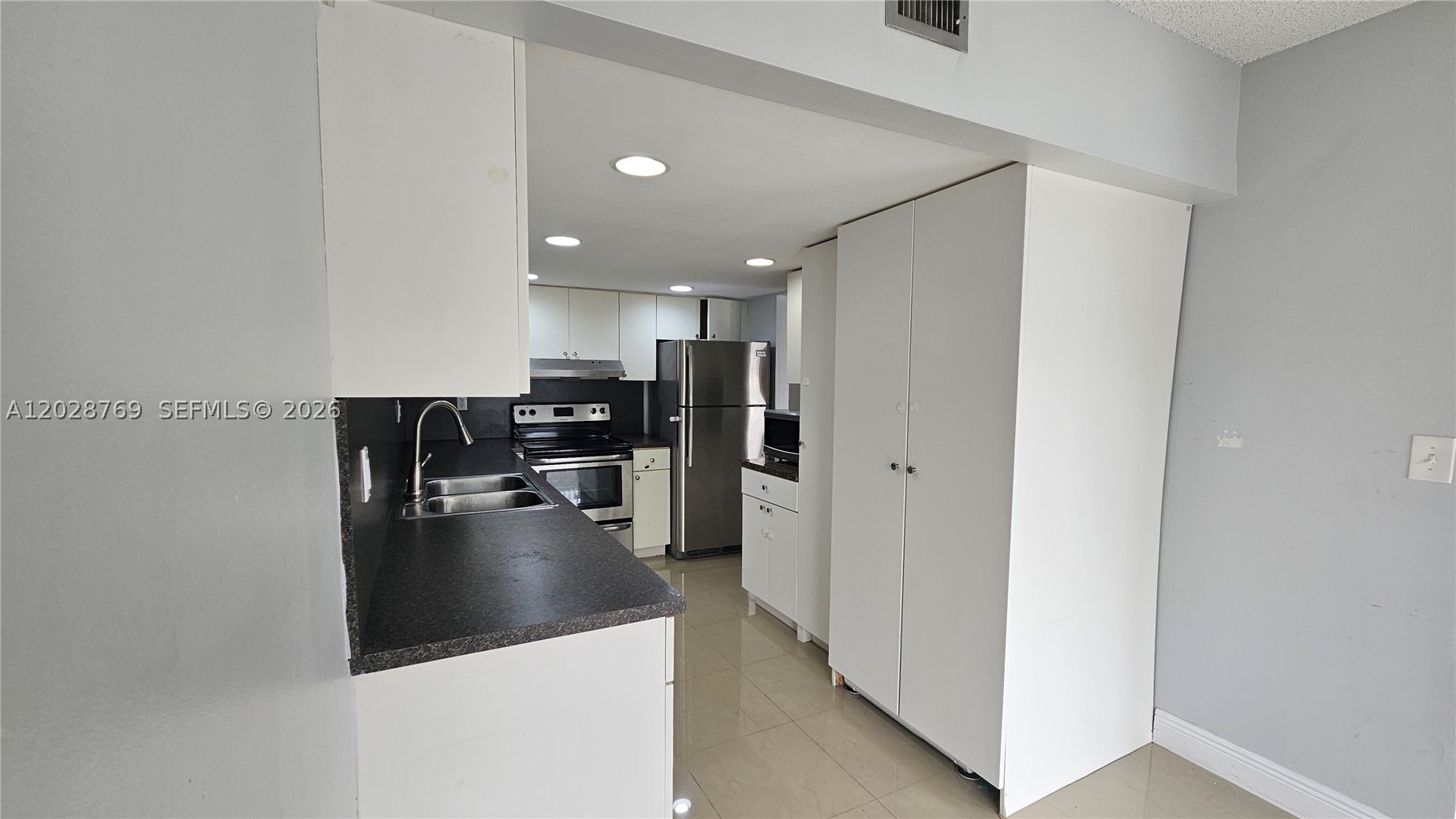 MILLER GARDENS CONDO - Residential Lease