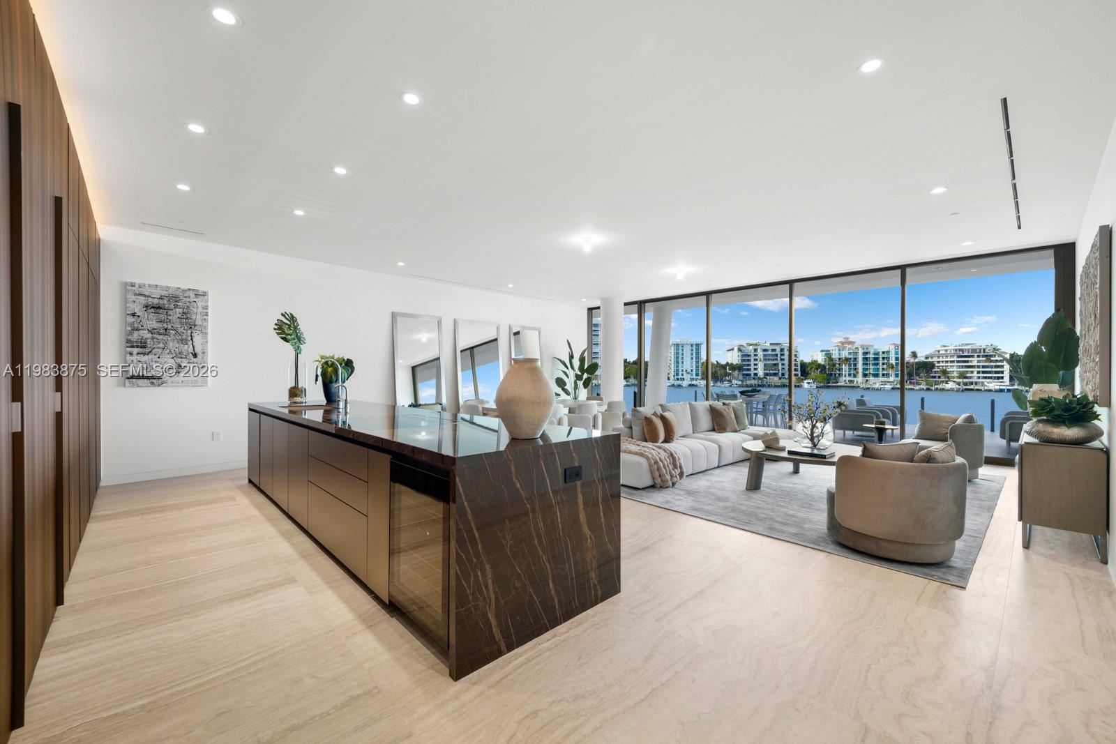 Brand New Construction in Coconut Grove on the exclusive 20-acre gated Grove Isle private island. Residence L205 at Vita, never lived in, is a 3BR/3.5BA residence featuring a unique ~1,100 SF extended private terrace—larger than most residences— creating seamless indoor-outdoor living. Bright open floor plan with abundant natural light and en-suite bathrooms in every bedroom. A dedicated elevator opens to your private foyer, and a rare private one-car garage—located directly beneath the residence and included with the purchase— offers exceptional convenience, plus two valet parking privileges. Luxury finishes include Molteni Italian cabinetry, Miele appliances, wine cooler, Dornbracht fixtures, and pre-installed Crestron and Lutron HomeWorks smart home systems. Residents enjoy 24-hour security/concierge services, marina access, waterfront walking paths, tennis/padel courts, wellness spa and fitness center, children’s playground, and an upcoming waterfront restaurant by the owners of Daniel’s. Green-certified building, only 65 residences.