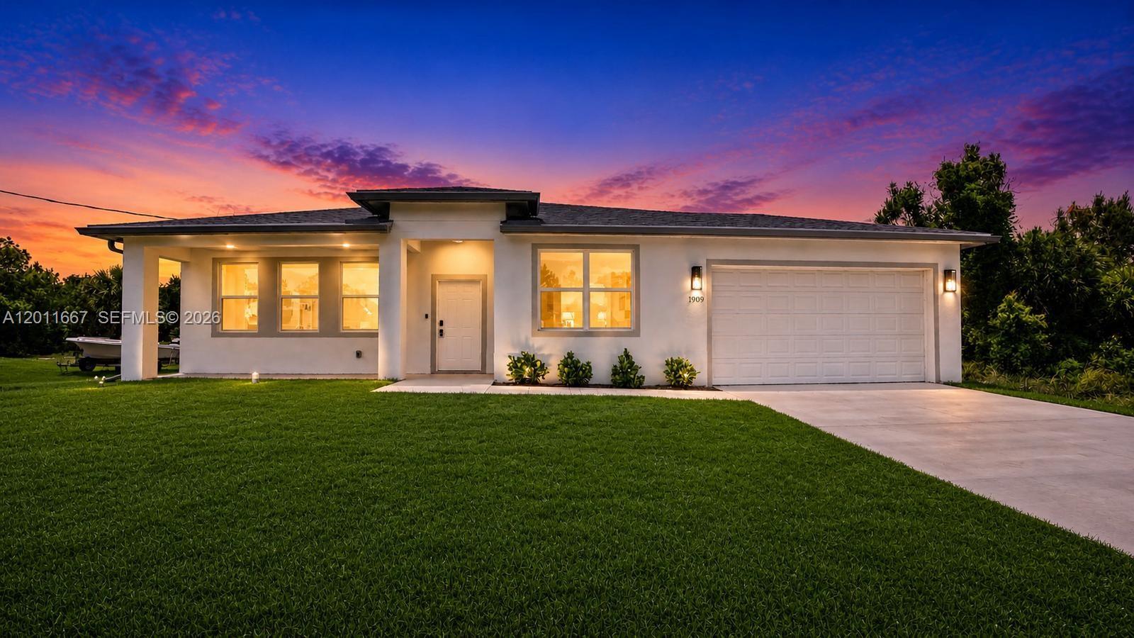 BRAND NEW construction on a spacious HALF-ACRE LOT with NO HOA, NO CDD, and NO flood insurance required—offering the perfect combination of freedom, privacy, and low-maintenance Florida living. Centrally located close to shopping, dining, entertainment, and everyday conveniences, this beautifully built 3-bedroom, 2-bath home with a 2-car garage delivers modern luxury and exceptional value. Designed with both style and functionality in mind, this light-filled open floor plan features IMPORTED TILE FLOORS throughout, soaring ceilings, recessed LED lighting, and smart home technology for everyday convenience. An abundance of IMPACT WINDOWS and elegant FRENCH DOORS flood the home with natural light while providing peace of mind and storm protection no matter what Mother Nature brings. The chef-inspired kitchen is the centerpiece of the home, showcasing TOP-OF-THE-LINE stainless steel appliances, stunning QUARTZ countertops, custom cabinetry, perfect for entertaining and family gatherings. Retreat to the HUGE primary suite featuring a spacious walk-in closet and a spa-like master bath complete with dual his-and-her sinks, designer finishes, and a glass-enclosed shower tiled all the way to the ceiling. Additional highlights include a full laundry room with washer and dryer included, quality craftsmanship throughout, and plenty of outdoor space with endless possibilities for a pool, guest house, workshop, RV, boat storage, or future expansion. Perfect for homeowners seeking extra space and privacy or investors looking for a clean, move-in-ready property with strong long-term appeal. Priced to sell fast—schedule your private showing today before this exceptional opportunity is gone!