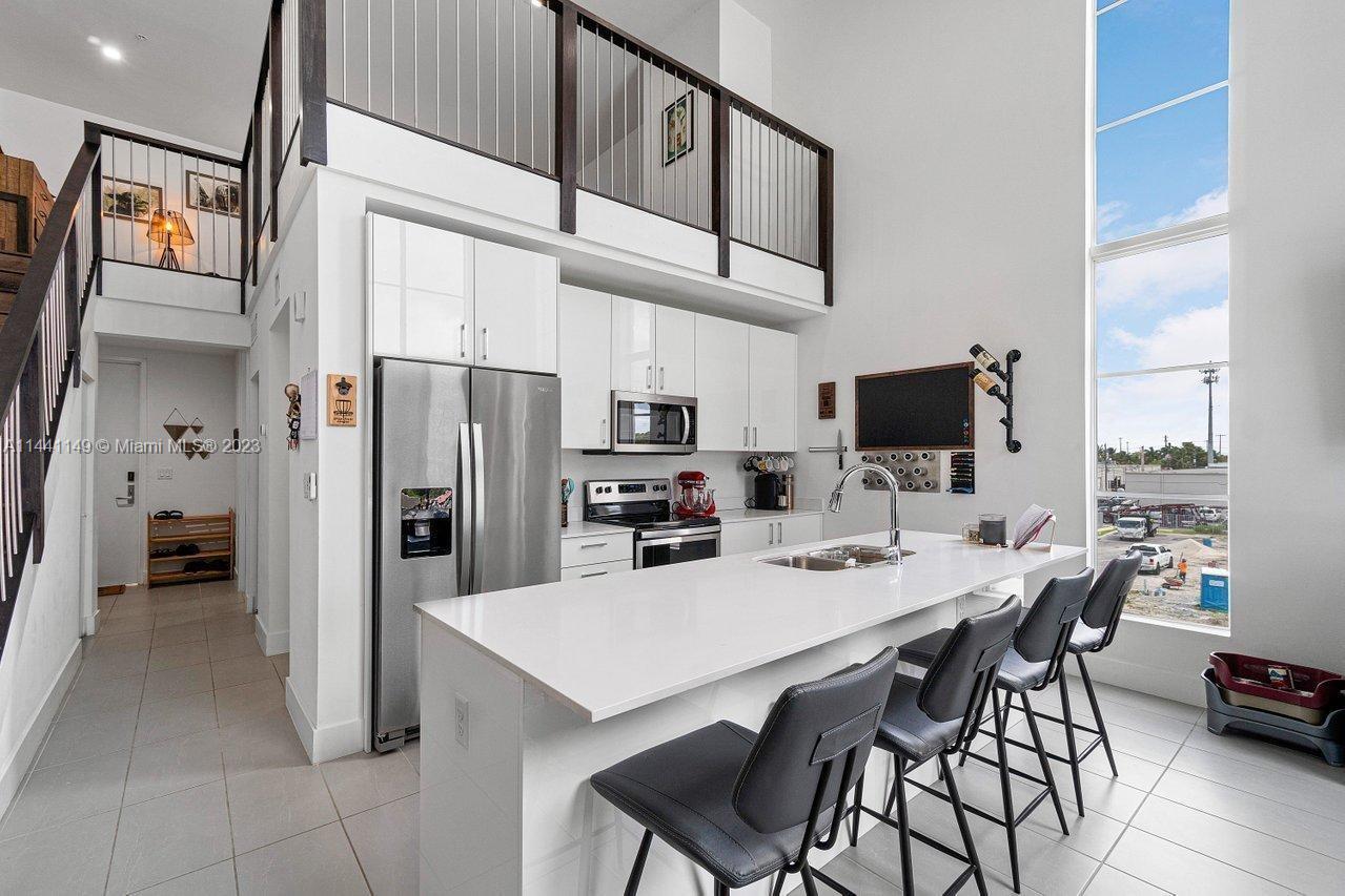 Contemporary New York City Style Loft, 2 bedroom/ 1 bath, with a 240 sqf mezzanine. Built in 2019, and a rarely available CORNER unit, featuring 18 ft high ceilings with impact windows, upgraded 12x24 ceramic titles, custom white cabinetry and kitchen island, quartz countertop, custom electric shades and high efficiency in unit washer and dryer. 
5 blocks West of Downtown Oakland Park, 3 blocks North of Oakland Park Boulevard, 1 mile from Wilton Dr and less than 15 minutes from the beach.

Offer must come with complete credit report, 2 pay stubs, letter of reference from previous landlord, ID, rental application, proof of income and clear background check.