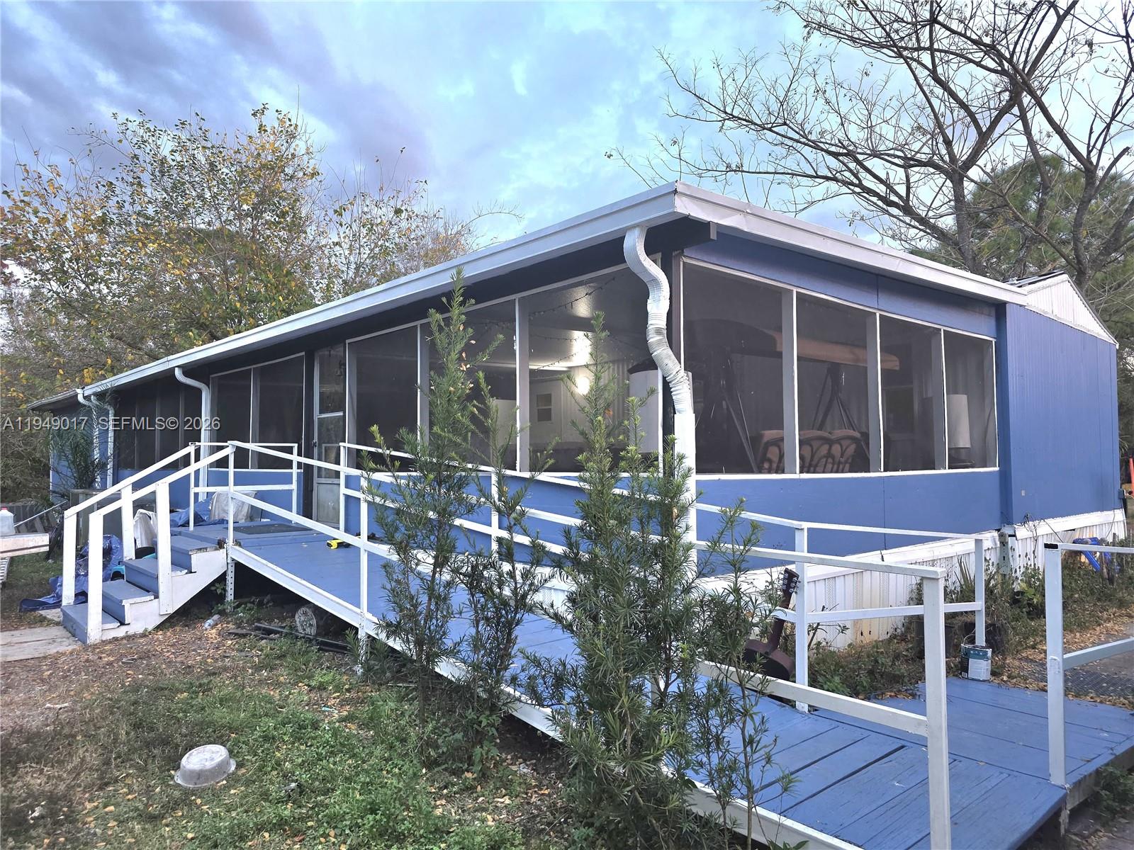 Manufactured home located in Montura Ranch offering 3 bedrooms and 2 bathrooms on a spacious 2.5-acre lot. The property features approximately 3,400 sq ft of interior living area and is partially remodeled, providing great potential for customization or investment. Appliances included are refrigerator, microwave, washer, and dryer. Enjoy a peaceful rural setting with no HOA and plenty of space for animals, RVs, trucks, equipment, or future improvements. Ideal for buyers seeking privacy, land, and flexibility. Cash or conventional financing only; buyer to verify zoning, land use, and measurements. Easy to show—contact listing agent for details.