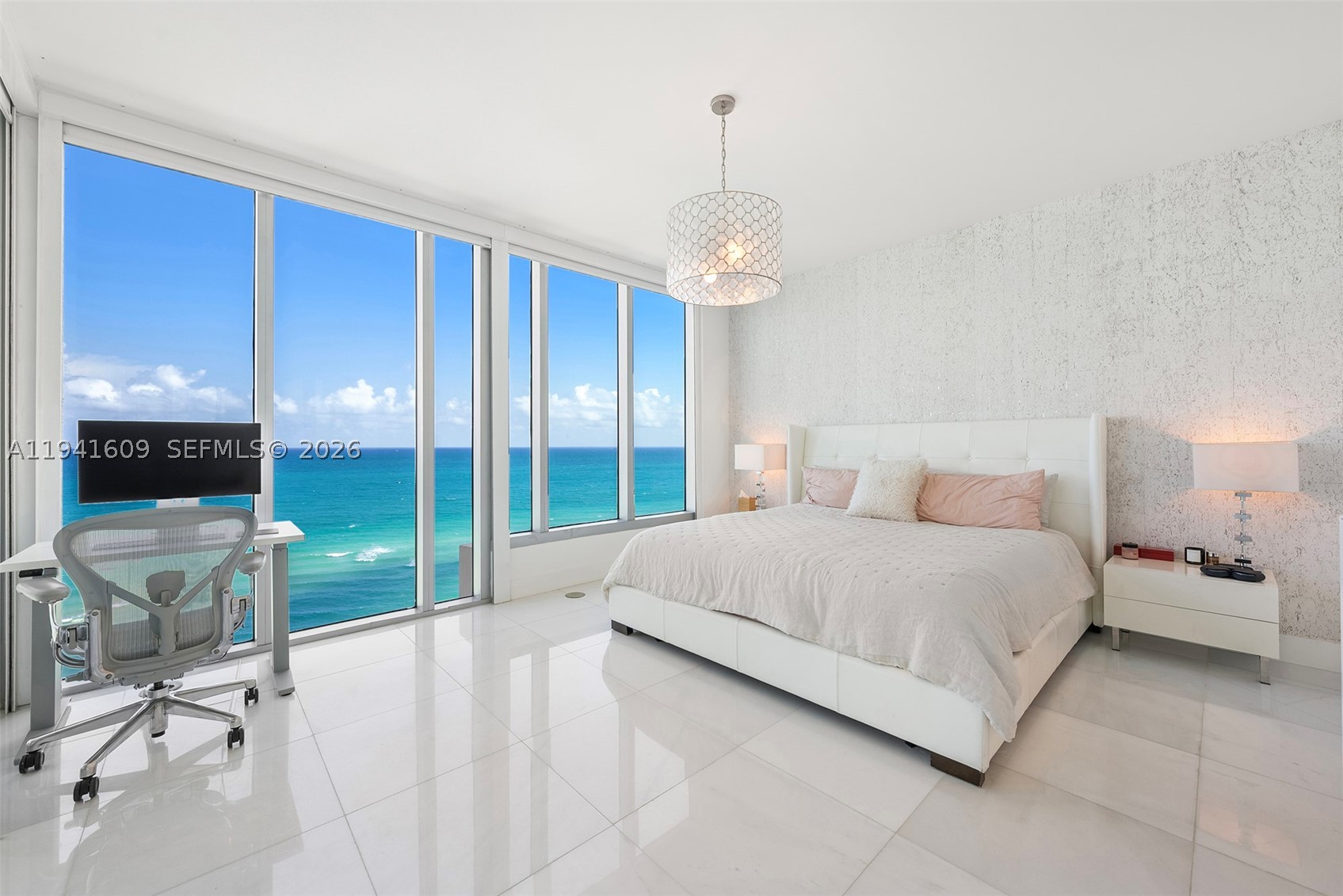 Direct oceanfront corner residence with expansive Atlantic views in the North Tower of Carillon Wellness Resort & Residences, widely regarded as the premier wellness property in South Florida. This 2BD/2BA NE corner home offers floor-to-ceiling ocean views, a private North Tower entrance & refined modern finishes throughout. The open kitchen features Italian cabinetry, marble flooring, Miele, Sub-Zero fridge and wine cooler. Ownership includes valuable Beach Club & Wellness Center memberships, providing full access to 9+ acres of oceanfront amenities: private beach club, four pools, a 70,000-SF fitness & facility, Pilates studios, 100's of daily fitness classes, hydrotherapy, sauna & steam, meditation gardens, Juice Bar, Michelin Pop-up and on-site wellness experts. A rare opportunity for true wellness-driven luxury living at the highest level. BEST PRICED CORNER DIRECT OCEAN FOR NORTH TOWER. LONG OCEAN VIEWS NORTH UP BEACH TO SUNNY ISLES. LINE RARELY ON THE MARKET.