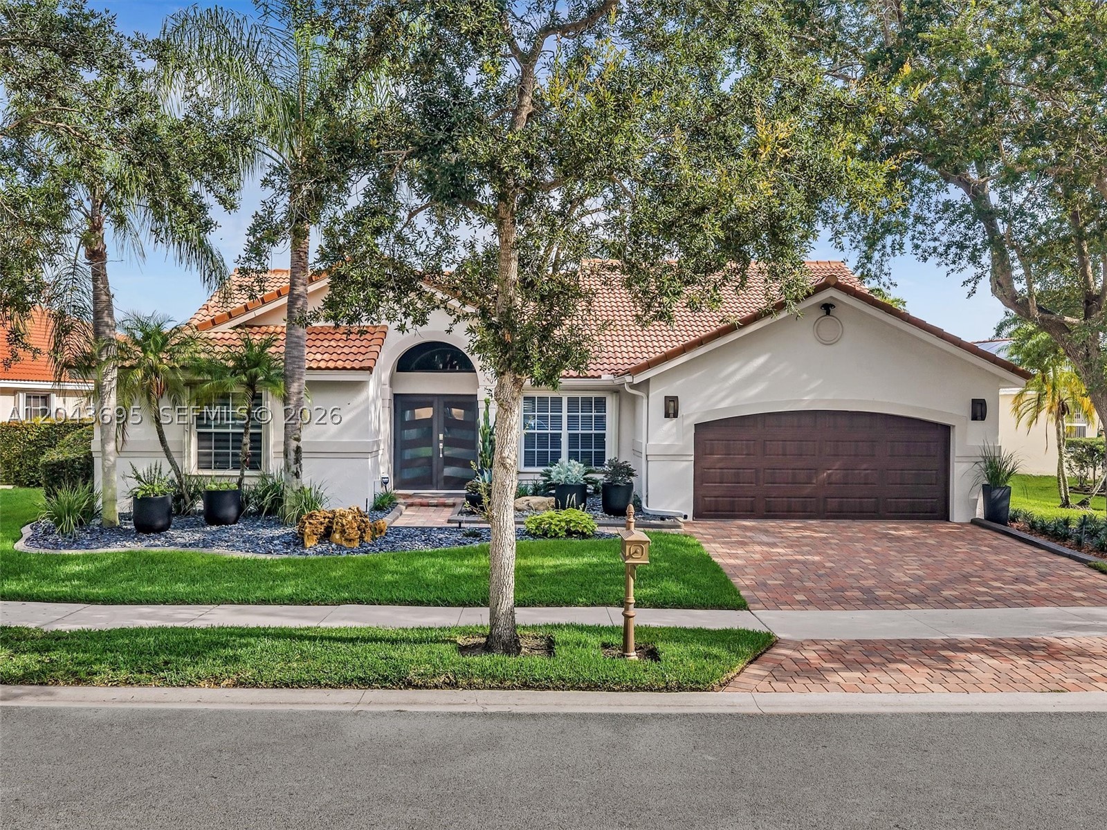 A rare opportunity to own an impeccably maintained one-story residence in one of Weston’s most sought-after
communities, where timeless elegance, everyday comfort, and exceptional entertaining spaces come together in
perfect harmony. Beautifully manicured landscaping and outstanding curb appeal create a memorable first
impression from the moment you arrive. Inside, this spacious home is thoughtfully designed for both comfortable
living and elegant entertaining, offering 4 bedrooms plus a versatile den/office that can easily serve as a fifth
bedroom (please see attached floor plan), along with 2.5 bathrooms. The gourmet kitchen serves as the heart of
the home, featuring a generous peninsula, an adjoining bar area, and abundant space for gathering with family
and friends. The well-appointed floor plan seamlessly blends functionality and style, creating inviting living spaces
that are both practical and refined. Step outside to a fully fenced backyard that offers a private outdoor retreat—
perfect for relaxing, playing, or entertaining year-round. Move-in ready and meticulously cared for, this exceptional
property presents a rare opportunity to experience the very best of Weston living. Furniture Also Negotiable