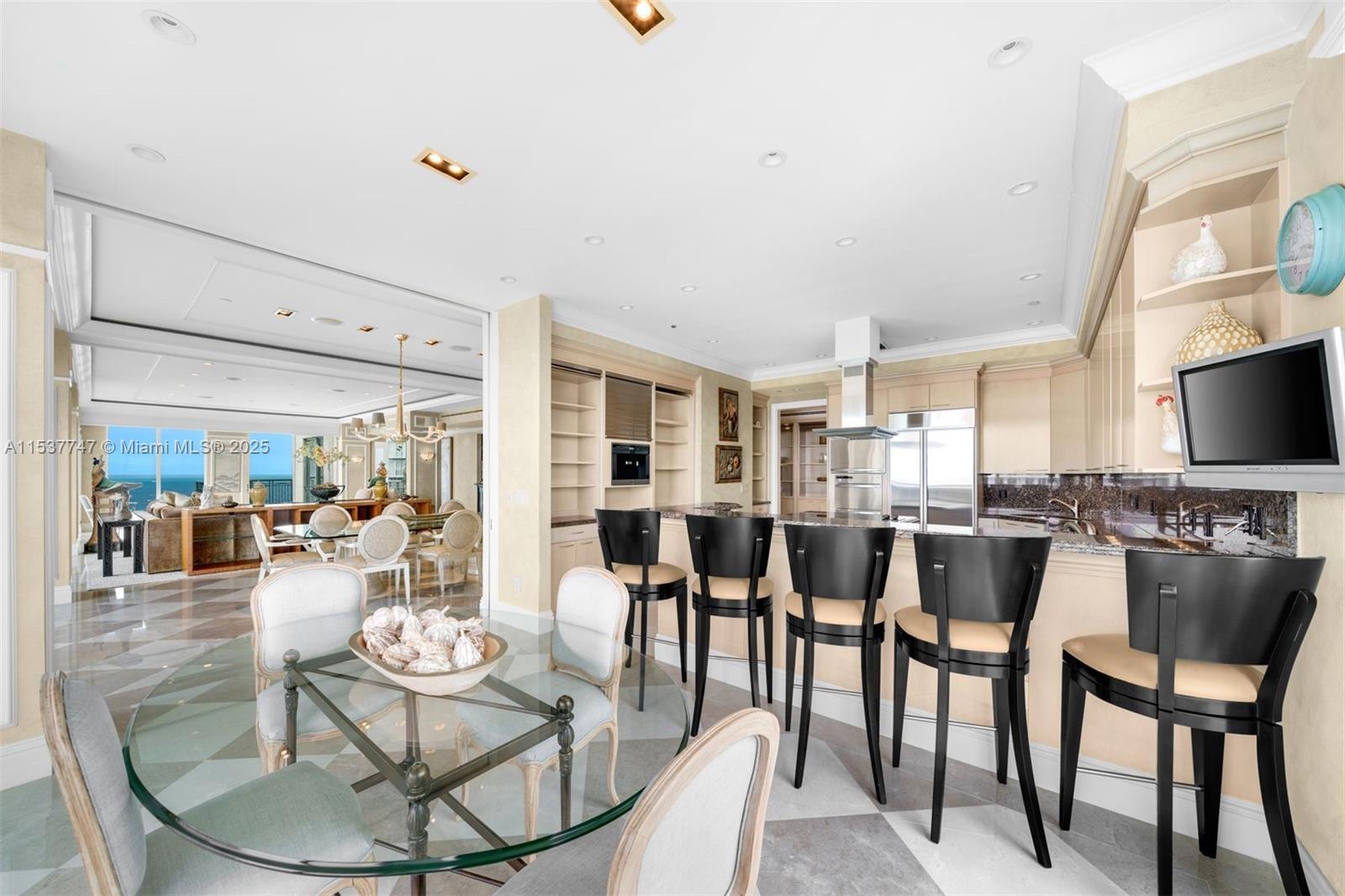 Experience elevated living at the Ritz-Carlton Penthouse on the 22nd floor, overlooking the Miami skyline and Biscayne Bay. With over 4400 sq. ft., this residence exudes sophistication, ample living and dining spaces with high ceilings, lavish interiors, and spacious terraces. Dedicated reception area and private Resident's elevator, tended by your personal concierge. Enjoy world-class amenities and services. Nestled in Coconut Grove, moments from vibrant culture and dining, this is the epitome of Miami living, and the city's heartbeat is at your doorstep. This is the pinnacle of refined living, offering an unparalleled blend of elegance and breathtaking views.