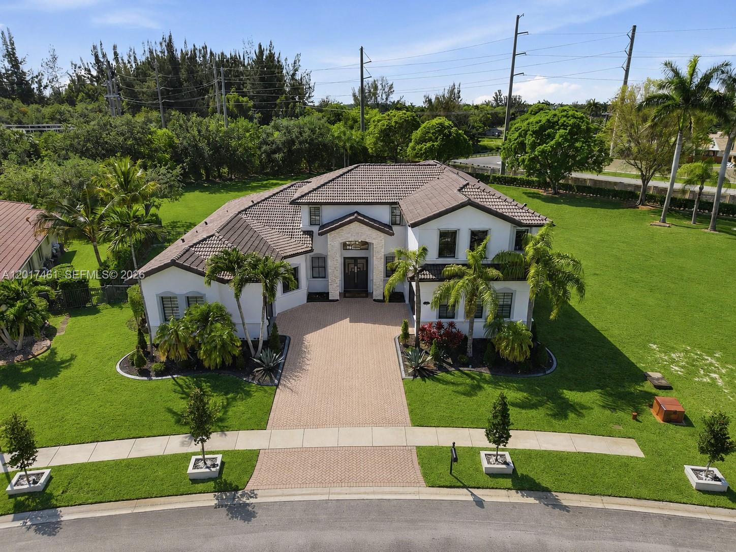 Located in the prestigious gated community of Harbour Lakes Estates, this stunning luxury residence offers 4,555 SF of living space on an expansive 12,861 SF lot. Featuring 5 bedrooms and 4.5 bathrooms, this home perfectly blends comfort, elegance, and functionality. Soaring ceilings, abundant natural light, and spacious living areas create an inviting atmosphere throughout.

The beautifully remodeled kitchen is the centerpiece of the home, showcasing a massive 6x10 Italian quartz island, stainless steel appliances, new flooring, and modern finishes throughout. Additional upgrades include two A/C units, new washer and dryer, zebra blinds, and all-new interior and exterior lighting. The oversized primary suite provides a spacious and relaxing retreat on the first floor. 

Step outside to a private backyard oasis featuring a terrace and a luxury pool currently under construction. Buyer to assume completion of the pool.
