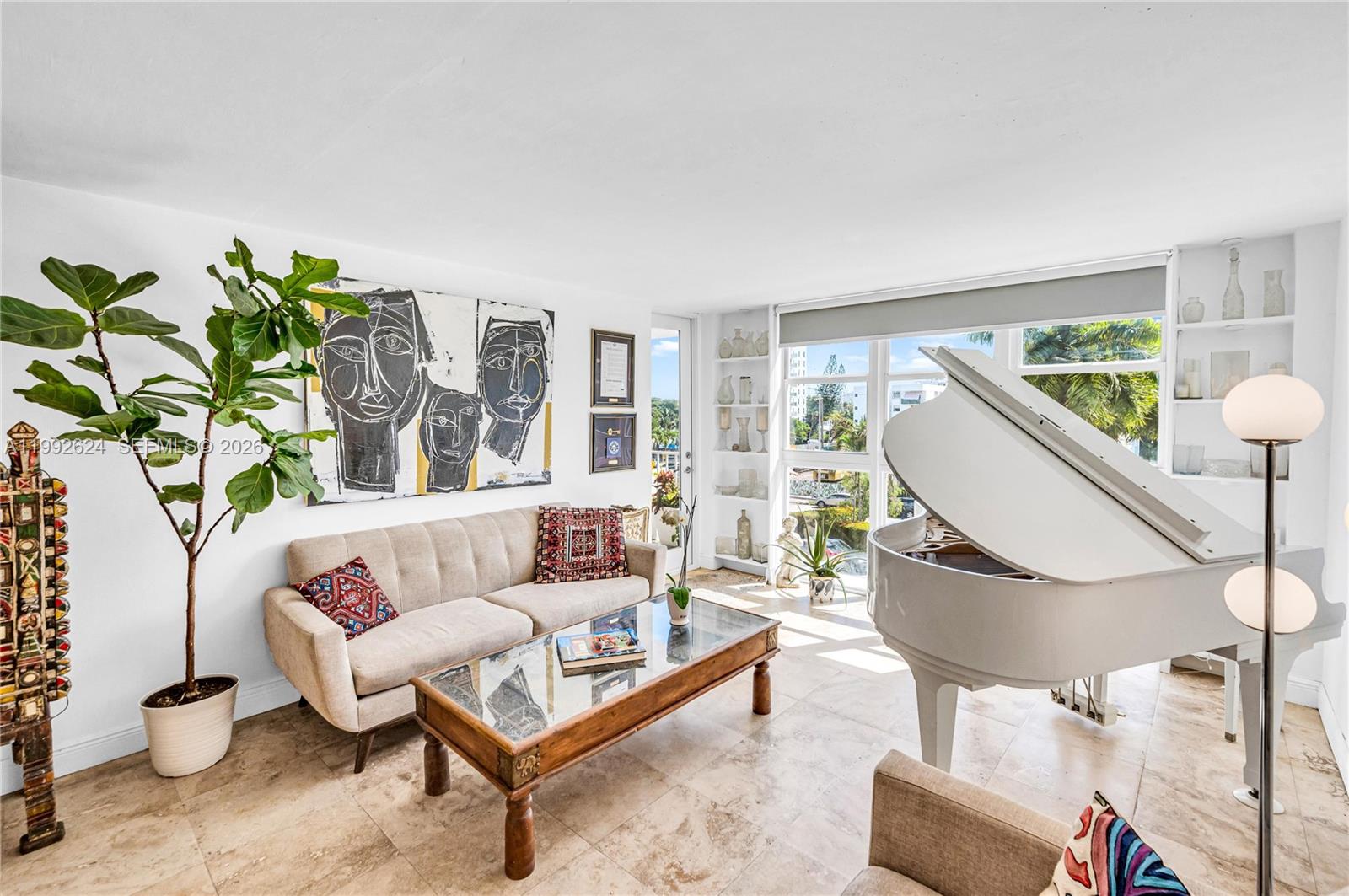 Sunny, OVERSIZED and oh so spacious east facing unit in the heart of South Beach. Updated unit with an open kitchen, impact windows, balcony accessible from bedroom and living roo. PLUS a HUGE walk in closet!! Great updated building with extra storage, centrally located and convenient laundry room, nicely equipped gym, beautiful bay side pool, and ......dockage as available for unit owners!. How sweet it is! Whole Foods, great restaurants, Lincoln Road.....steps away.  Pet friendly building and FINANCIABLE!