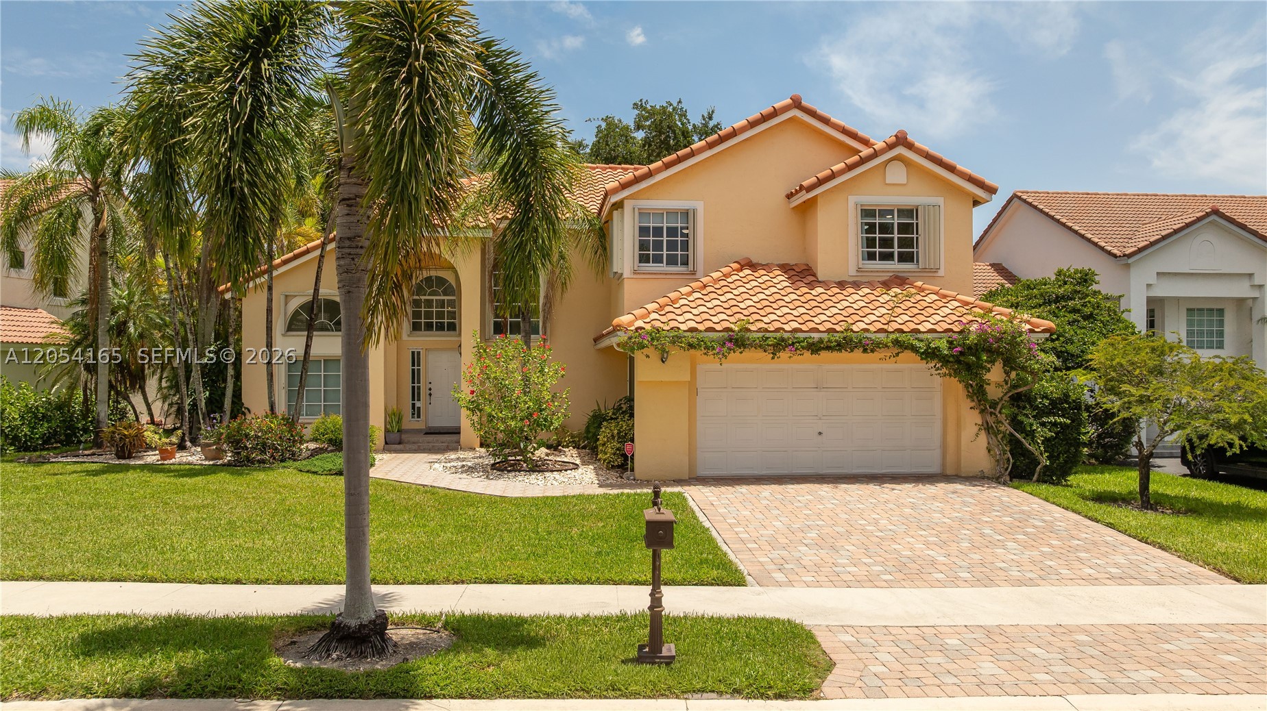 An inviting and thoughtfully updated two-story residence in Weston’s gated Laguna Springs II, designed for comfortable and versatile modern living. This spacious home features 3 bedrooms, 2.5 bathrooms, and a versatile loft that can serve as an office, media area, or quiet retreat. The thoughtfully designed layout includes bright living spaces, high ceilings, and a modern kitchen with contemporary finishes. Natural light fills the home, creating an inviting and comfortable atmosphere ideal for everyday living and entertaining. A flexible additional area on the main level provides options for work, play, or personalized use, offering the ability to tailor the space to lifestyle needs. Additional features include accordion shutters throughout, an electric vehicle charger, and a spacious 2 car garage. Enjoy a private backyard with room to relax and entertain. The home benefits from a serene water backdrop located just to the right of the yard, offering a peaceful setting without being directly behind the property. Convenient access to parks, shopping, dining, and major roadways makes this an ideal location to enjoy the Weston lifestyle.