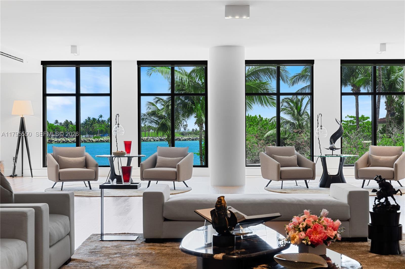 LUXURY IN MINIMALISM DESIGNED IN ELEGANT HUES OF GRAY & TAUPES IN THIS PALATIAL CORNER RESIDENCE WITH BAY VIEWS ON FISHER ISLAND’S PALAZZO DEL SOL! Oversized 7,630 SF of Pristine Interiors in an Armani Casa Vibe with Nearly 3,000 SF of Deep Wraparound Terraces. This 5 Bedroom + Study & 6.5 Bathroom Home is Exceptionally Maintained like New. 2 Private Elevators lead you to your Mammoth Bayfront Great Room with Elegant Formal Dining & Lounging Areas—Media Room with Sculptural Oak Louvers. Elegant White Boffi Kitchen showcases a stone Eat-in Island + Gaggenau Appliances & Temp-Controlled Wine Room & Pantry—adjacent Family Room with a Massive Terrace perfect for Entertaining. The Massive Primary Suite with Ocean-Facing Terrace features its own Office, Clad in Oak Millwork. Two Luxurious Custom Walk-in Closets. Primary Bathroom wrapped in Bookmatched Carrara Marble, Double Vanity Sink, & Boffi Soaking Tub & Rainshower. All Bedrooms feature En-suite Baths + Terraces with Lush Tropical Views. 2 Parking + 2 Golf Cart Spaces + Storage Unit.

Palazzo Del Sol is an Award-Winning Building by Kobi Karp, Antrobus Design, & ASR Construction. Building Amenities & Services include Butler-Serviced Aperitivo Bar & Lounge, Theater, Hair & Makeup Salon, Private Massage Rooms, Business Center, Gym & Cardio Room, Kidville Playroom, Concierge, Valet, Zero-Edge Pool & Spa with Attendant.