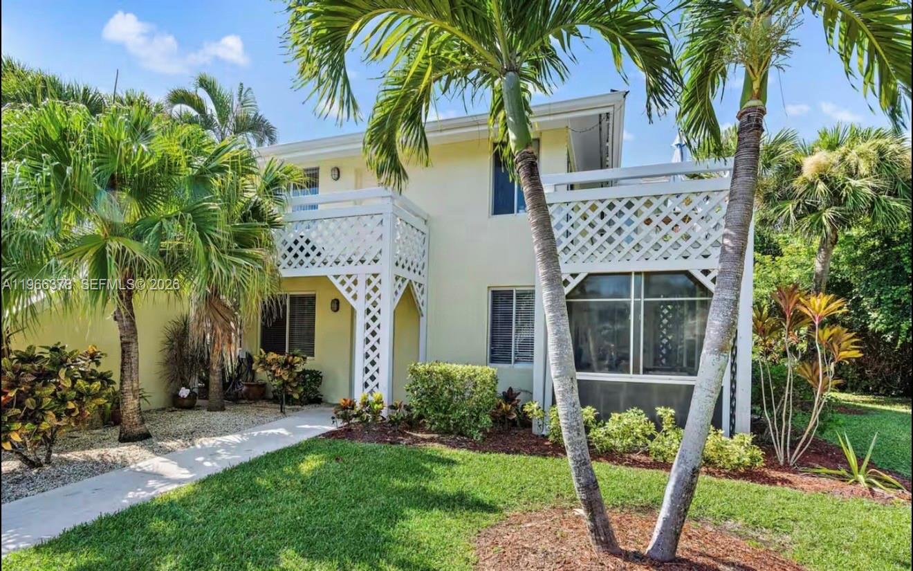 NO RENTAL RESTRICTIONS! SELLER WILL TRANSFER EXISTING AIRBNB AND VRBO RESERVATIONS (UPON REQUEST) TO IMMEDIATELY YIELD INCOME! Enjoy resort style living with two heated pools, tennis courts, Twisted Tuna restaurant, paved promenade around the community lake, and a short walk to the beach! This lovely GROUND FLOOR VILLA has a private screened patio and accommodates 6 guests with one king size bed, two twin beds, and two rollaway beds. All furniture and decor is INCLUDED WITH THE SALE, and has been perfectly appointed for comfortable accommodations. This unit has been well cared for and is a MUST SEE!