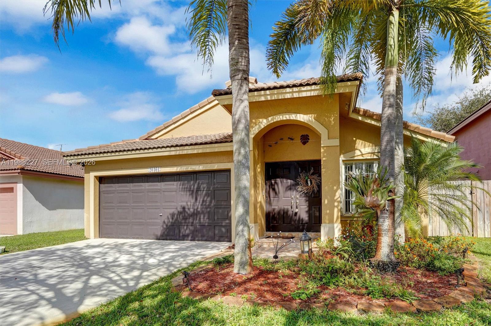 Prime Location. This charming home is just 3 minutes from HWY 27 (Okeechobee) and 15 minutes from I-75, offering easy access to major highways. Spacious layout. The property features three bedrooms, two full bathrooms, and a two-car garage, making it ideal for families or those seeking comfort. Quality Features. Includes an energy-efficient tankless electric water heater for on-demand hot water. Private Outdoor Space. The backyard boasts a relaxing jacuzzi and fruit trees (mango, avocado, and papaya), perfect for outdoor enjoyment. Nearby Amenities. Just a 3-minute walk to a community park with a swimming pool and tennis courts, ideal for recreation and leisure. No HOA approval required. No association approval needed for move-in. Low Monthly Fee: Only $130.