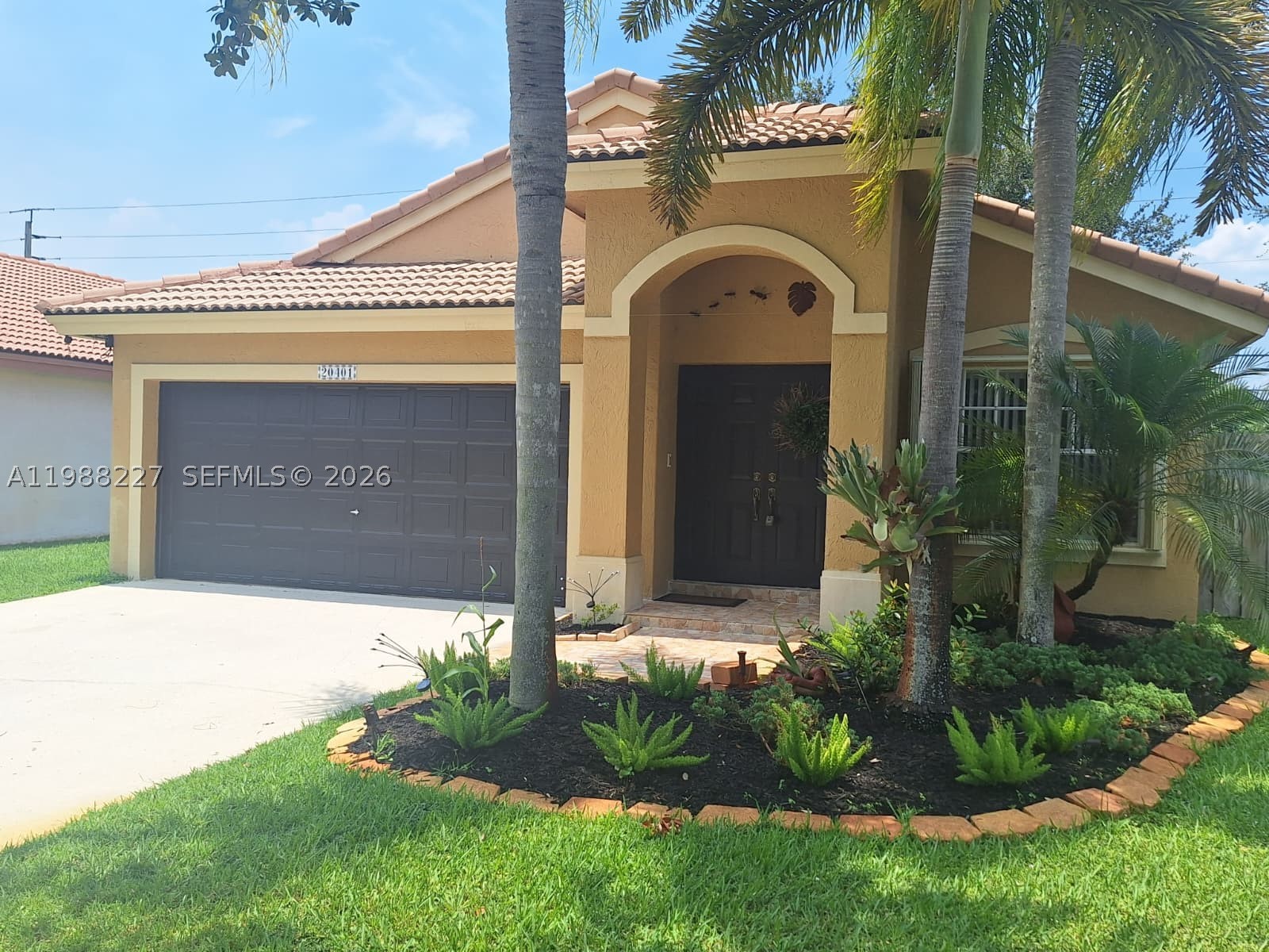 Prime Location. This charming home is just 3 minutes from HWY 27 (Okeechobee) and 15 minutes from I-75, offering easy access to major highways. Spacious layout. The property features three bedrooms, two full bathrooms, and a two-car garage, making it ideal for families or those seeking comfort. Quality Features. Includes an energy-efficient tankless electric water heater for on-demand hot water. Private Outdoor Space. The backyard boasts a relaxing jacuzzi and fruit trees (mango, avocado, and papaya), perfect for outdoor enjoyment. Nearby Amenities. Just a 3-minute walk to a community park with a swimming pool and tennis courts, ideal for recreation and leisure. No HOA approval required. No association approval needed for move-in. Low Monthly Fee: Only $130.