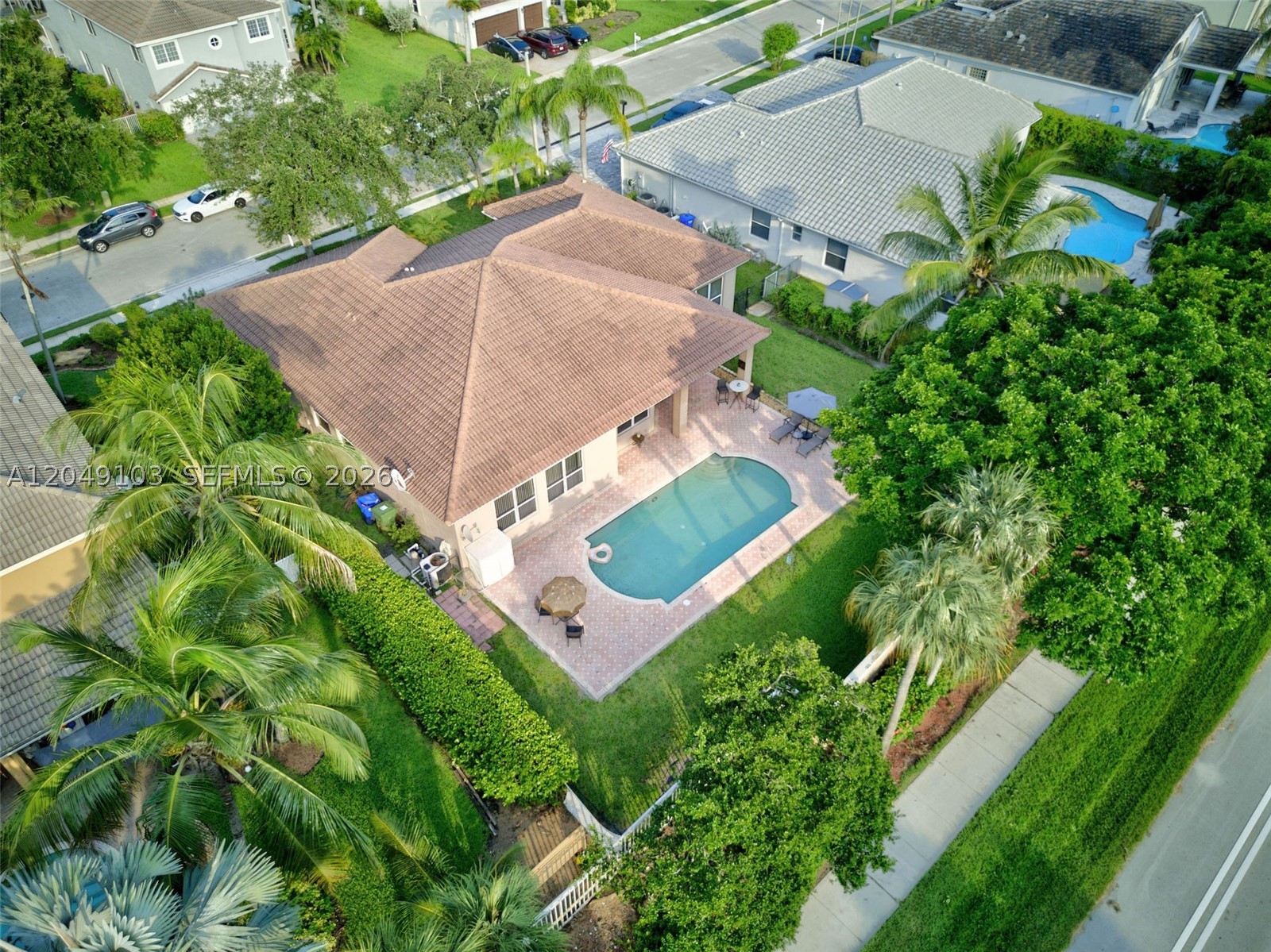 Welcome to the Estates of Pembroke Shores! This spacious one-story home offers 3,446 total square feet with 4 bedrooms, a Den, 2 bathrooms, and a desirable triple-split floor plan designed for comfortable living and effortless entertaining. Situated on a 9,458-square-foot lot, the private backyard features a Roman-style sport pool, perfect for relaxing or gathering with family and friends. The spacious primary suite includes a spa-inspired bath with a Jacuzzi soaking tub and walk-in shower. Priced to provide exceptional value, this home offers an incredible opportunity to update and personalize to your own style. Located in the highly sought-after gated community of the Estates of Pembroke Shores, you’ll enjoy a family-friendly neighborhood with easy access to I-75, shopping, dining, and The Shops at Pembroke Gardens. Don’t miss this rare opportunity to make this home your own! The home has been virtually staged in some photos to illustrate the potential of its spaces and furnishings