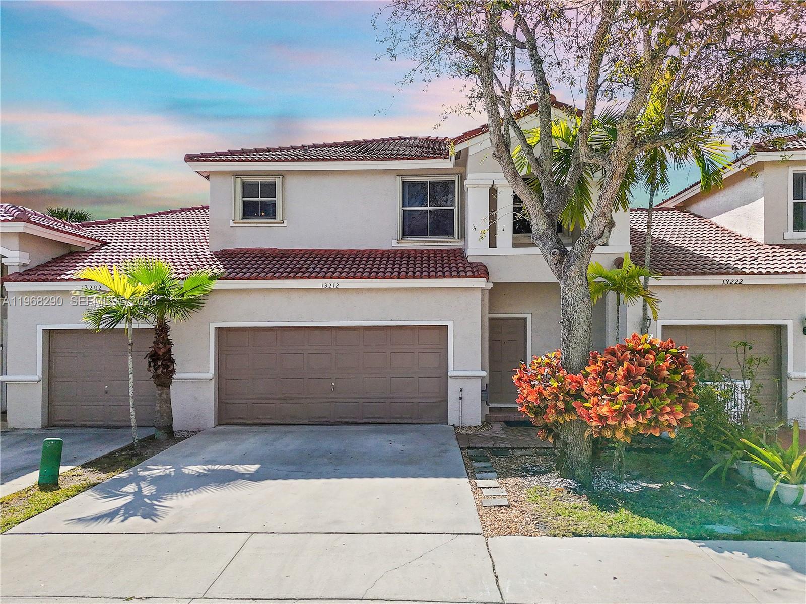Discover this beautiful lakefront 3-bedroom, 2.5 bathroom, 2 car garage townhouse in the highly sought after gated community of Lowells Landing in Pembroke Falls. This property features an upgraded kitchen with stainless steel appliances, granite countertops, wood cabinets & bright eat-in-kitchen. There are tile floors throughout and upgraded 1/2 bathroom. All bedrooms are located on the second floor. Enjoy your private tiled patio in your backyard oasis overlooking the tranquil lake.  Community amenities include a pool, security gate with call box and lawn care for both the front and back yard. Lowells Landing is a peaceful, well-kept community and is close to shopping, dining, parks and major highways.