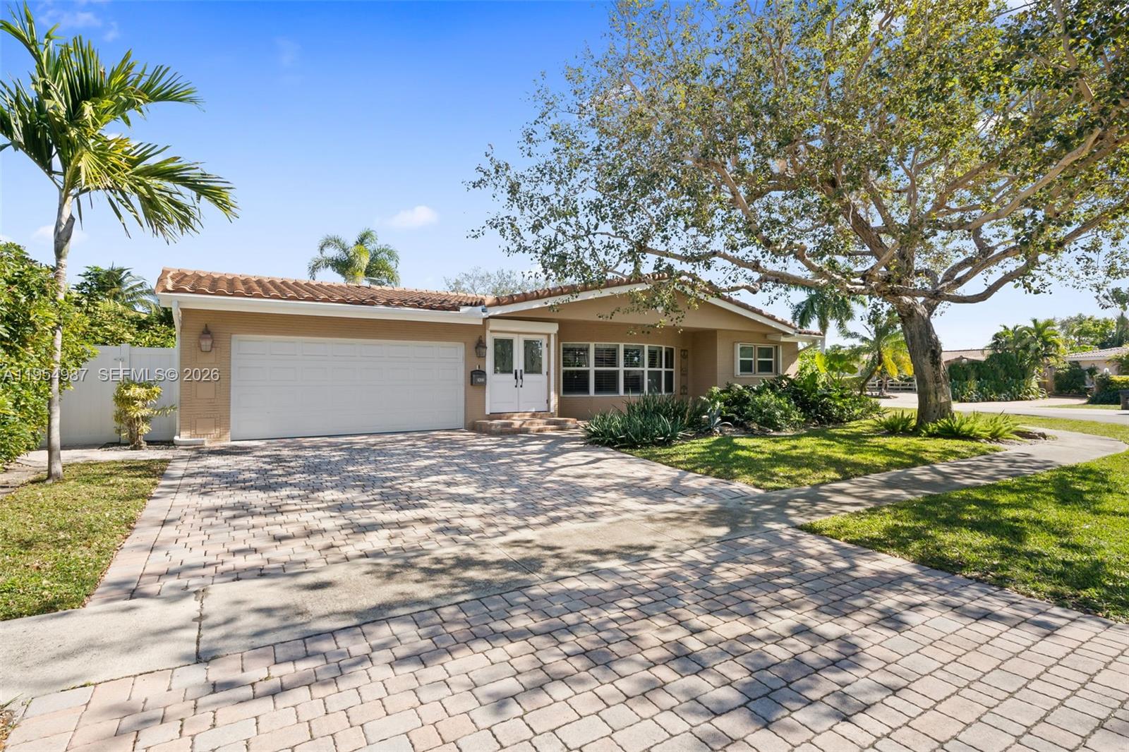 IMPACT WINDOWS and NEWER ROOF in Imperial Point, Fort Lauderdale! This spacious single-family residence features a fully fenced backyard, lush Clusia privacy hedges, and a modern in-ground swimming pool, creating a true South Florida outdoor living experience. The open-concept kitchen is oversized and perfect for entertaining, ideal for hosting family and friends.

This 3-bedroom, 2-bathroom home offers a split floor plan, walk-in closets in every bedroom, and a primary suite with generous closet space. As one of the larger interior square footage models in Imperial Point, the home provides a bright, functional layout with an additional den area.

Major features and upgrades include a newer roof, 2-car garage, and well-maintained systems. The A/C is 2021 and five year warranty transferable to new buyers. Located minutes from the beach, shopping, and top-rated dining, with an easy commute to Boca Raton, Miami, and downtown Fort Lauderdale. Close to Lauderdale-by-the-Sea, known for its walkability, restaurants, and coastal lifestyle.

A rare opportunity to own a pool home in Imperial Point, one of Fort Lauderdale’s most desirable neighborhoods, perfect for primary residence or second home.