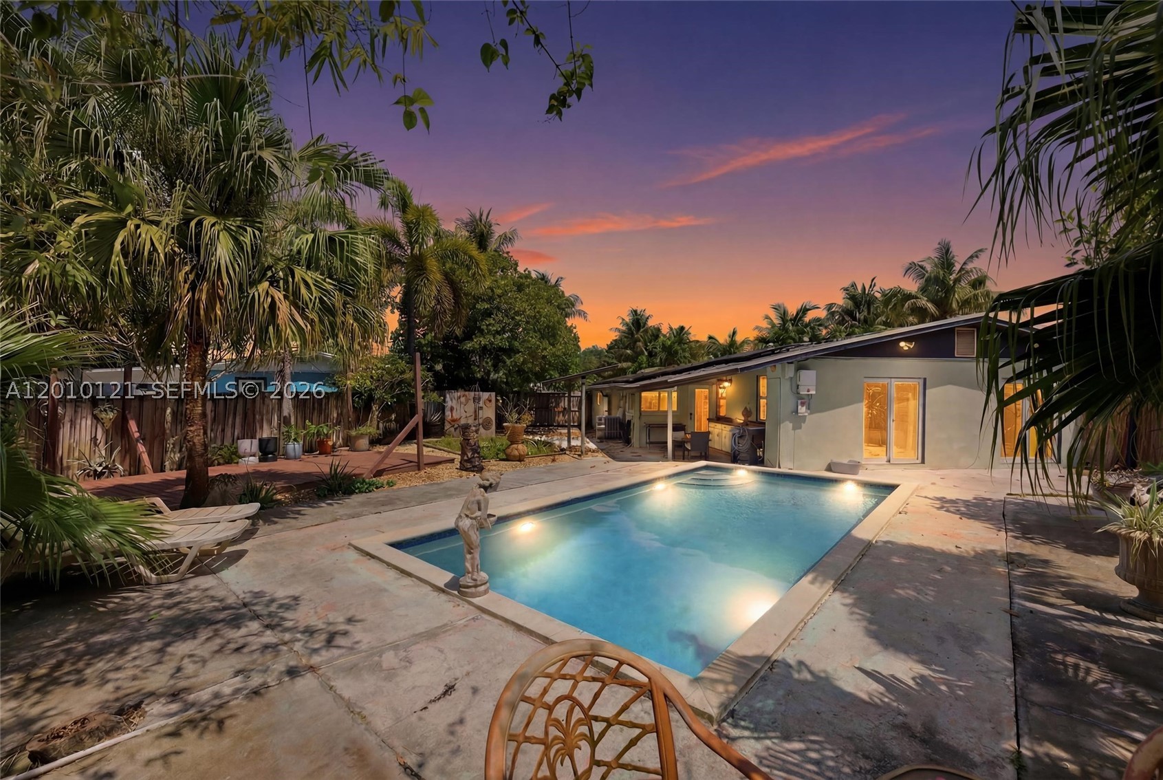 Welcome To This Stunning 3 Bed / 2 Bath Pool Home Located In The Heart Of Ft. Lauderdale On A Large Oversized Lot With No HOA! This Home Is A Rare Find Featuring A Large Driveway And A Double Gate Entrance For Boat Or RV Parking. Elegant Open Layout Boasting Rich Brazilian Cherry Wood Flooring, Recessed Lighting, And Elegant Plantation Shutters. The Heart Of The Home Is The Beautifully Updated Kitchen, Featuring Sleek Granite Countertops, A Glass Tile Backsplash, SS Appliances, A Breakfast Bar, And A Spacious Pantry For Extra Storage. The Primary Suite Is A True Retreat W/Warm Wood Floors And Private Access To The Pool Area With An Ensuite Bathroom That Is Tastefully Upgraded W/ White Shaker Cabinets, A Glass Countertop Vanity, And A Frameless Glass Enclosure Shower. Step Outside To Your Backyard Paradise Surrounded By Lavish Landscaping And Fruit-bearing Mango Trees. The Refreshing Pool Has A Salt System, Motor Pool Cleaner. Enjoy Serene Garden & Pool Views From Every Angle. This Outdoor Space Is Fully Equipped For Sustainable Living With A Chicken Coop And Storage Shed. Peace Of Mind Is Guaranteed With A Private Safe Room Closet, Impact Windows, Front Accordion Protection, 2023 AC System, Tankless Hot Water Heater, Upgraded Electrical Panel, And 2016 Roof. Solar Electric To Be Paid Off At Closing For Low Electric Bill. Centrally Located And Move-in Ready, This Home Offers The Best Of South Florida Living. Close To Shopping, Highways, & Beaches. Must see!