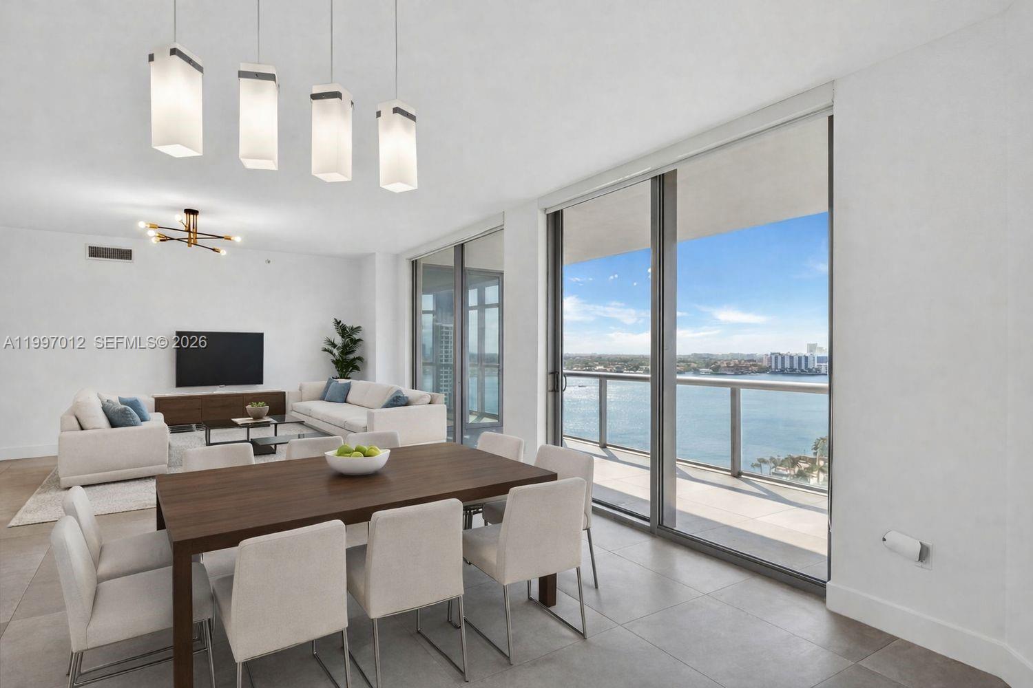 2 Bedroom + DEN! Waterfront corner unit in a newer 2015 building featuring floor-to-ceiling impact windows and stunning views of the water, bay, and city. This spacious residence offers nearly 2,000 sq ft of living space, including a large den ideal for a home office or optional 3rd bedroom. Located in a gated community just minutes from Aventura Mall, Sunny Isles Beach, and Oleta River State Park—perfect for biking, kayaking, and outdoor recreation. Enjoy the convenience of numerous restaurants, shops, and everyday essentials nearby. Experience resort-style living at Marina Palms with exceptional amenities including a waterfront fitness center, bayfront pool, kids’ playroom, party lounge, and more. Ideal for boating enthusiasts with exclusive access to Marina Palms’ private marina just steps from your door. Priced to sell.
