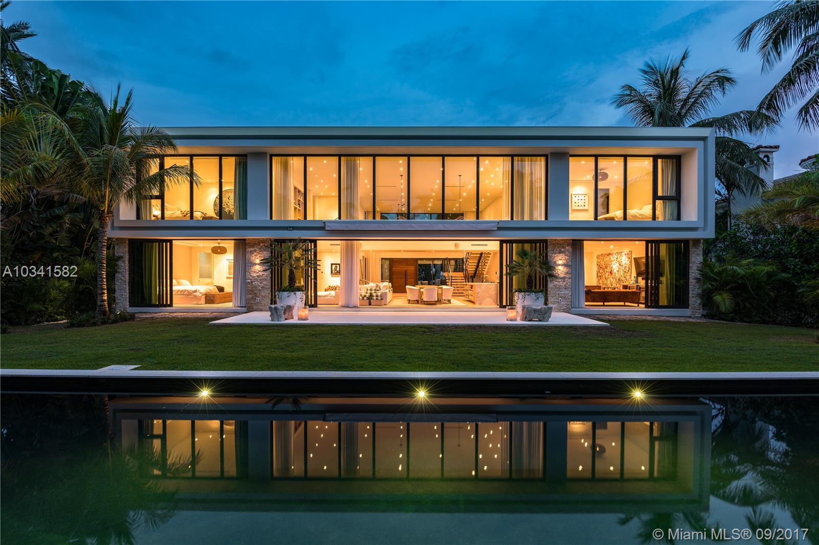 Brand new construction across from park on Sunset Island #2. Contemporary 5400 sq. ft. for a total of 6 bedrooms, 6.5 bathrooms, office, game room, double story living room, gourmet chef kitchen. Built by Todd Michael Glaser & designed by Domo Studio.