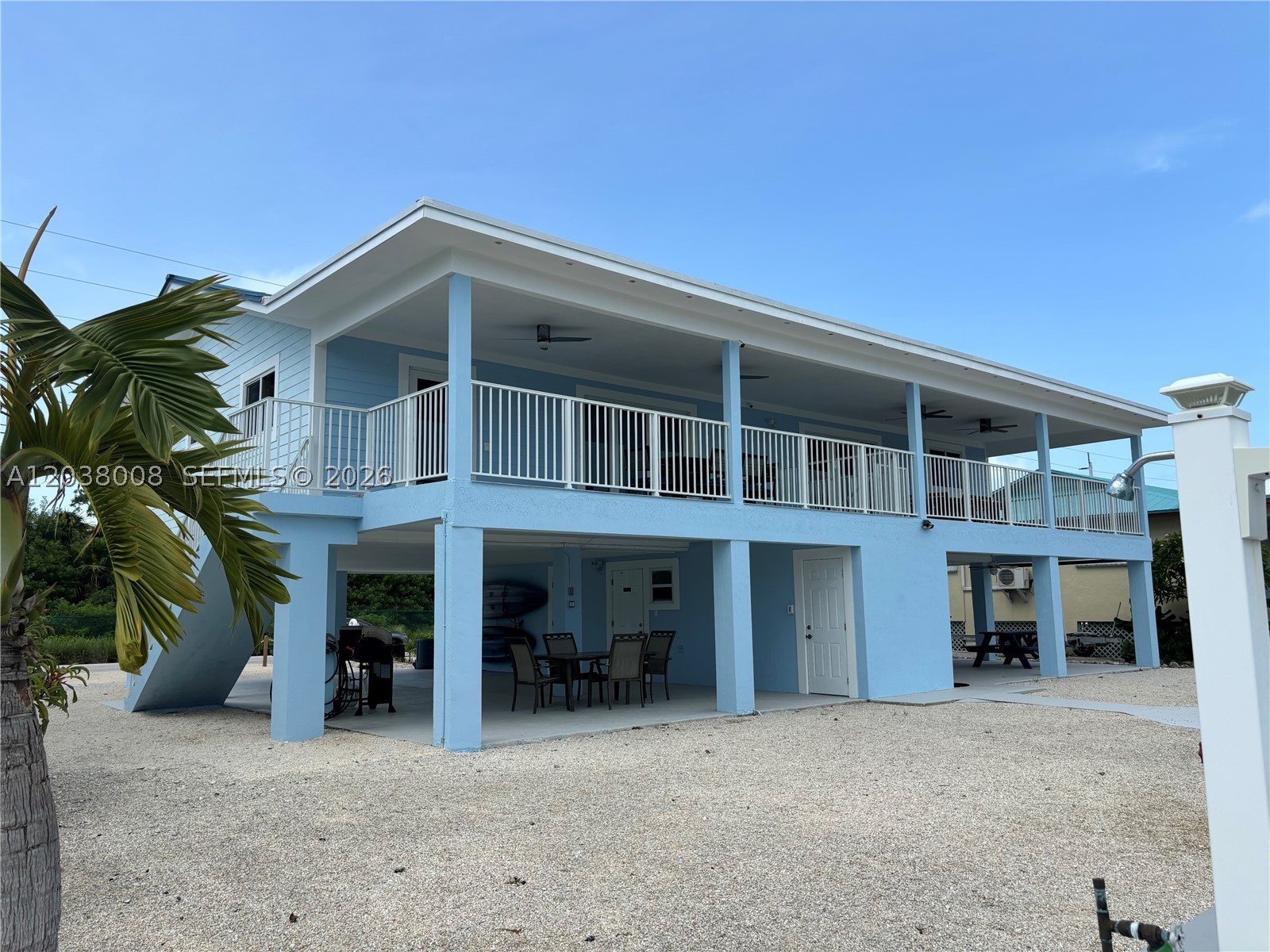 Beautiful canal front home, completely renovated inside and out in the heart of Marathon ready to move in. Light and airy 2 bedrooms, 2 baths with balcony and terrace overlooking water. Great location, in a canal with short distance to open waters,with access to ocean or florida bay. It has wood laminated floors throughout, beautiful kitchen with stainless still appliances and quartz counter tops, also impact windows and doors. Great deck with gorgeous view.  It can be rented with or without furnitures.