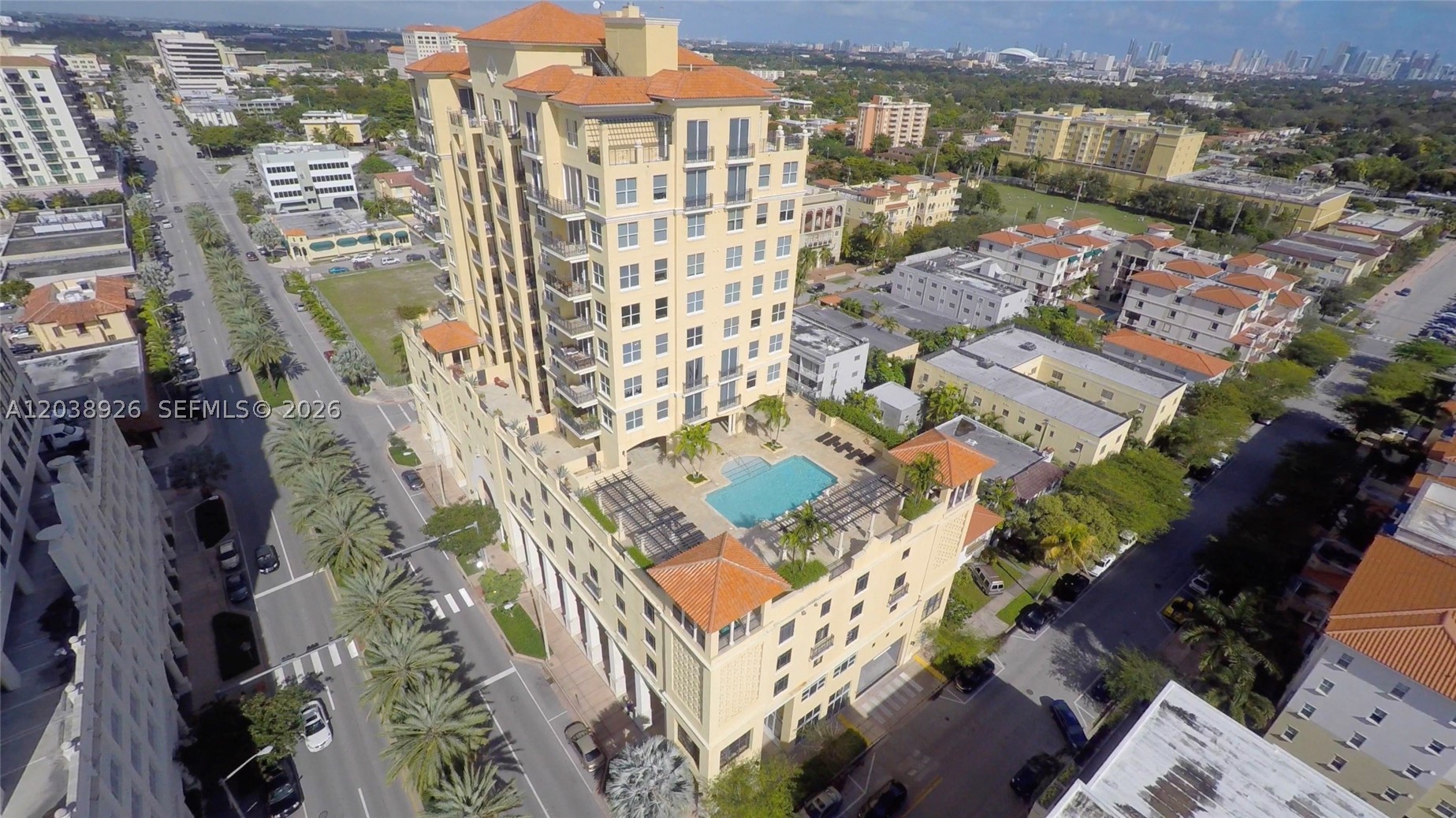 Turnkey office space in The Ponce de Leon Condominium building, 2 offices, a large bullpen area with cabinetry, a kitchen with built-in microwave for eating and relaxing, 974 square feet with lots of natural light because it has wall to wall windows facing north and west. 3 covered and gated parking spaces with 24 hour security system. It is truly a prestigious boutique mixed use building with concierge services and only 9 commercial offices on the second floor, built in 2008. Perfect for an accountant, title company, law office, support services, real estate office, architect office and any other professional office. Only 10 minutes (3.3 miles) to Miami International Airport!