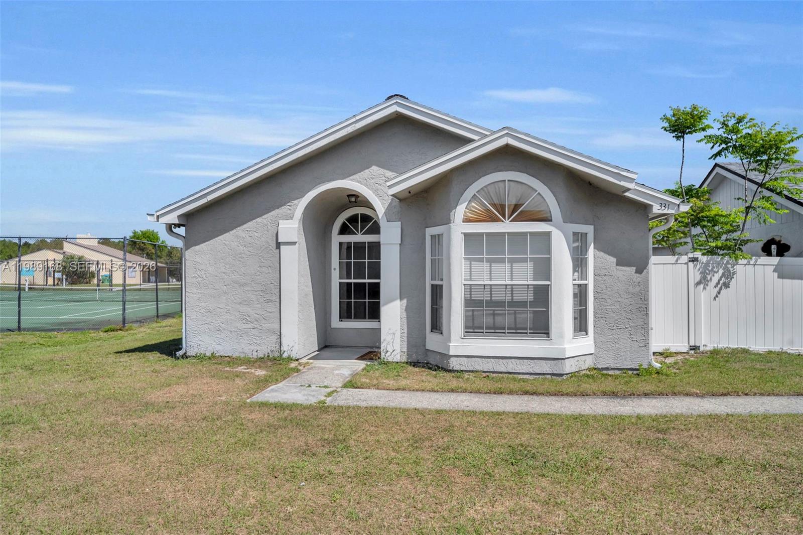 IN WINTER SPRINGS, FL 

Welcome to this beautifully refreshed 3-bedroom, 2-bathroom home located in the desirable Deersong community of Tuscawilla. This move-in-ready residence offers a perfect blend of efficiency and style, featuring a fully owned solar panel system on the roof that provides significant monthly energy savings. The interior has been tastefully updated with fresh paint throughout and brand-new tile flooring spanning the kitchen, hallway, and bathrooms.Ideally situated on a quiet street near the cul-de-sac, the property enjoys a premier location with enhanced privacy, as the community tennis courts are located directly behind the lot with no rear neighbors. Residents benefit from a low-maintenance lifestyle with a monthly HOA fee that covers front and side yard maintenance along with access to a sparkling community pool. Just a short stroll from Torcaso Park and the Winter Springs Town Center, this eco-friendly home is perfectly positioned to enjoy the best of the local area.