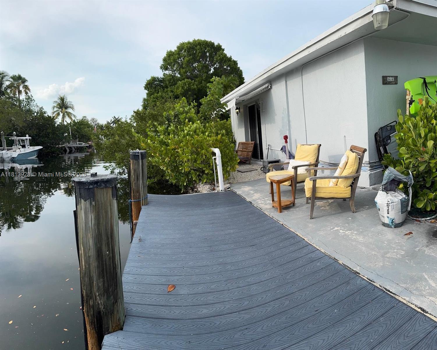 Welcome to your own piece of Florida Keys Paradise! This is a beautiful studio apartment located in the City of Marathon.  This property has canal views with direct Ocean access.  Park your boat right in the front  in your own private dock which is approximately 25' long. Property features freshly painted, and meticulously fully furnished Studio that includes, washer, dryer, 1 kayak, space for 2 vehicles to park.  This unit is close to everything! Vacant and it is ready to move in.