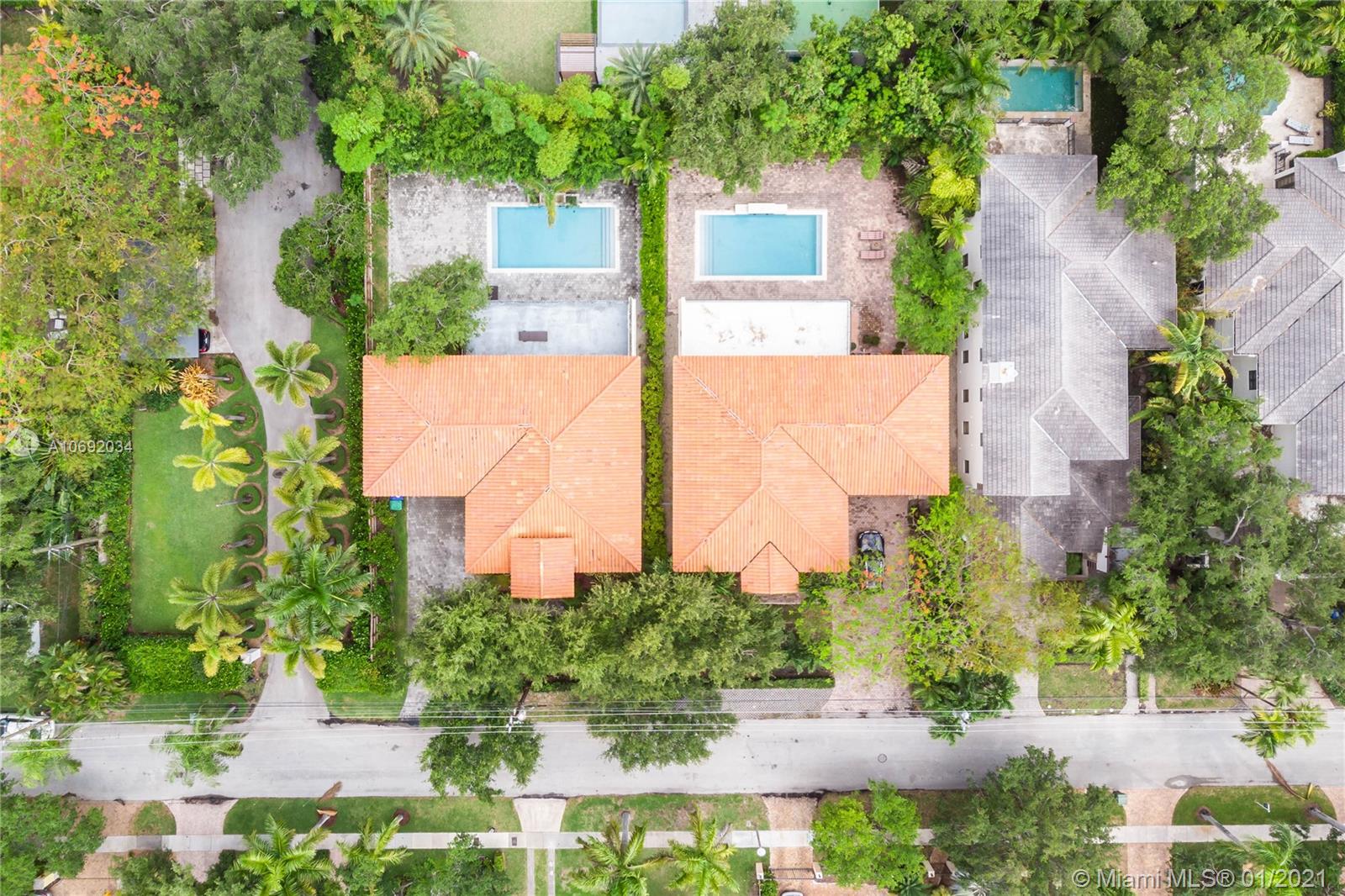Spectacular duplex located in North Grove. Minutes away from Coco Walk, Near Brickell, US1 and I95. This is a unique opportunity to own 2 detached single family homes in one of the most desired location in Miami. Can be good for investment or for two families. Each unit has 5 bedrooms plus a den on the first floor that can be used as an additional bedroom, 5 full bathrooms, private pool, marble floors, updated kitchen, impact windows, 2 car garages , second floor terrace. Unit #1 has 3515 sq ft and Unit#2 has 3510 sq ft.