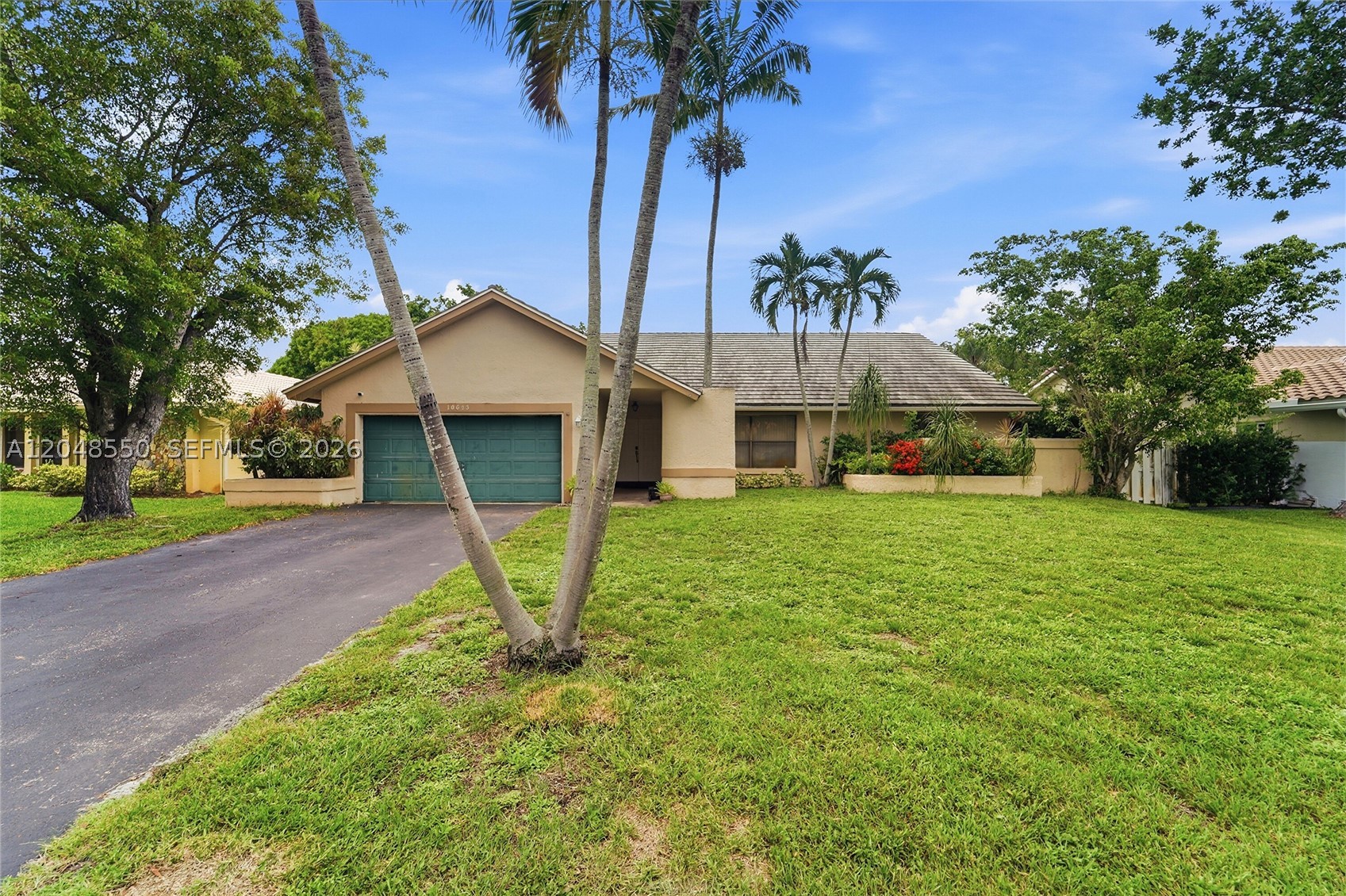 This bright, spacious 4-bedroom, 2-bath home in Coral Springs offers a large, fenced lot and a sparkling pool. Vaulted ceilings and tile flooring create a bright, airy atmosphere throughout. The spacious open-plan design is perfect for entertaining, with a kitchen beautifully remodeled in 2020. The home also features a brand-new 2025 A/C system and a 2-car garage. Plus, no HOA! Located in a desirable neighborhood, it’s close to schools, shopping, and major highways.”