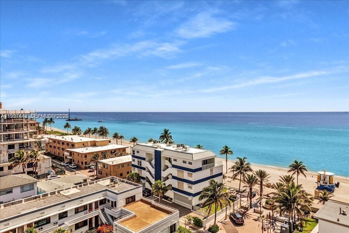Beachfront living at its finest! This beautifully maintained 2-bedroom, 2-bath residence in the desirable Hollywood Towers offers stunning panoramic views of both the ocean and Intracoastal from your private balcony. Spacious 1,120 sq. ft. layout with bright natural light and open living spaces. The building has completed its 40- & 50-year recertification—$80,000 assessment already paid by the seller—adding tremendous value with structural and aesthetic upgrades. Enjoy resort-style amenities including an oceanfront heated pool, BBQ area, fitness and sauna facilities, game room, banquet room, and direct beach access right on Hollywood’s famous Broadwalk filled with restaurants and boutiques. On-site restaurant, convenience store, secured lobby, underground parking, and hurricane-proof windows and doors complete the package.