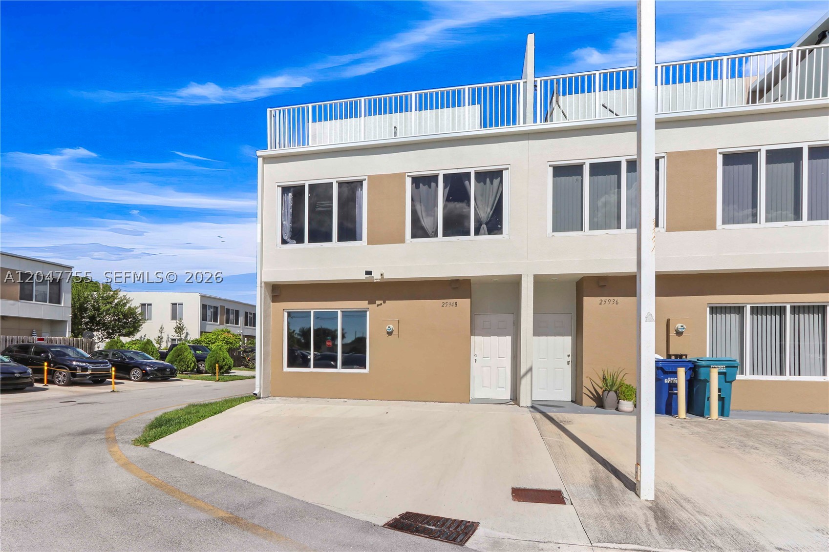 Beautiful 4-bedroom townhouse for sale in Homestead, FL. Built in 2021, this newer construction townhome offers modern living, spacious bedrooms, open living and dining areas, a functional kitchen layout, assigned parking, low HOA, and a private rooftop terrace perfect for outdoor entertaining, relaxing, or enjoying South Florida evenings. The home features a full bedroom and bathroom downstairs with its own independent exterior door, offering excellent flexibility for guests, extended household living, a home office, or private entry access. The rooftop terrace is already equipped with plumbing, offering added convenience and future possibilities; some neighboring owners have built out outdoor kitchens and entertainment areas. Convenient South Miami-Dade location near the Florida Turnpike, US-1, shopping, restaurants, schools, parks, Cutler Bay, Palmetto Bay, Kendall, Homestead Air Reserve Base, Black Point Marina, and the Florida Keys. Excellent opportunity for buyers searching for a Homestead townhome, newer construction home, low HOA property, rooftop terrace, downstairs bedroom, private entry, outdoor kitchen potential, or Miami-Dade townhouse with easy commuter access.