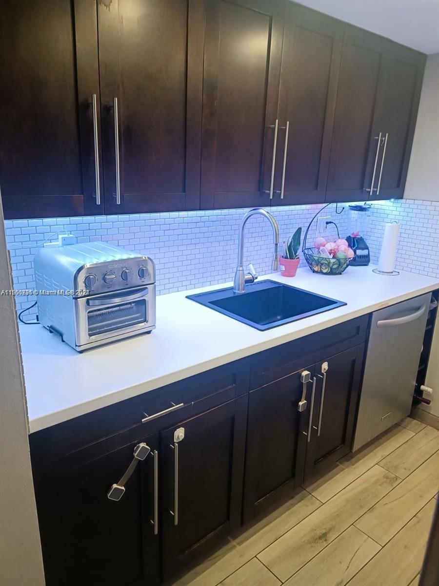 Spectacular 2BR/2BA apartment located in quiet residential neighborhood of historic Spring Garden. Close to public transportation. Gorgeous kitchen with new countertops, backsplash, modern cabinets, and stainless steel appliances. Very spacious bedrooms and living room, Two walk-in closets. Across the street from Winn Dixie supermarket. Close proximity to the University of Miami Hospital, Jackson Memorial Hospital, Brickell, Wynwood, and Downtown Miami. Newer building, built in 1997. Apartment faces lush scenery and has a view of Downtown Miami skyline.