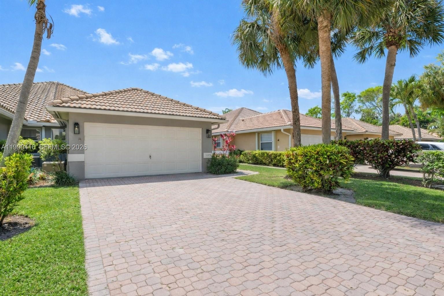A great opportunity on a well-maintained 2BR/2BA villa in highly desirable Palm Beach Bath & Tennis! Flexible layout with lots of possibilities featuring over 1,450 sq. ft. of bright, comfortable living space in a gated, all-ages, pet-friendly community. Home features a beautiful modern kitchen with granite countertops, newer stainless steel appliances spacious living and dining areas, an additional family room, vaulted ceilings, and a desirable split-bedroom floor plan. The primary suite offers wood floors, a large walk-in closet, and an ensuite bath with double vanity, shower, and soaking tub. Additional highlights include a dedicated laundry room and 2-car garage. Prime location, FHA and VA approved, with resort-style amenities including pool, spa, clubhouse, exercise room, tennis, and basketball courts. Prime location and best value in the area. See Broker Remarks.