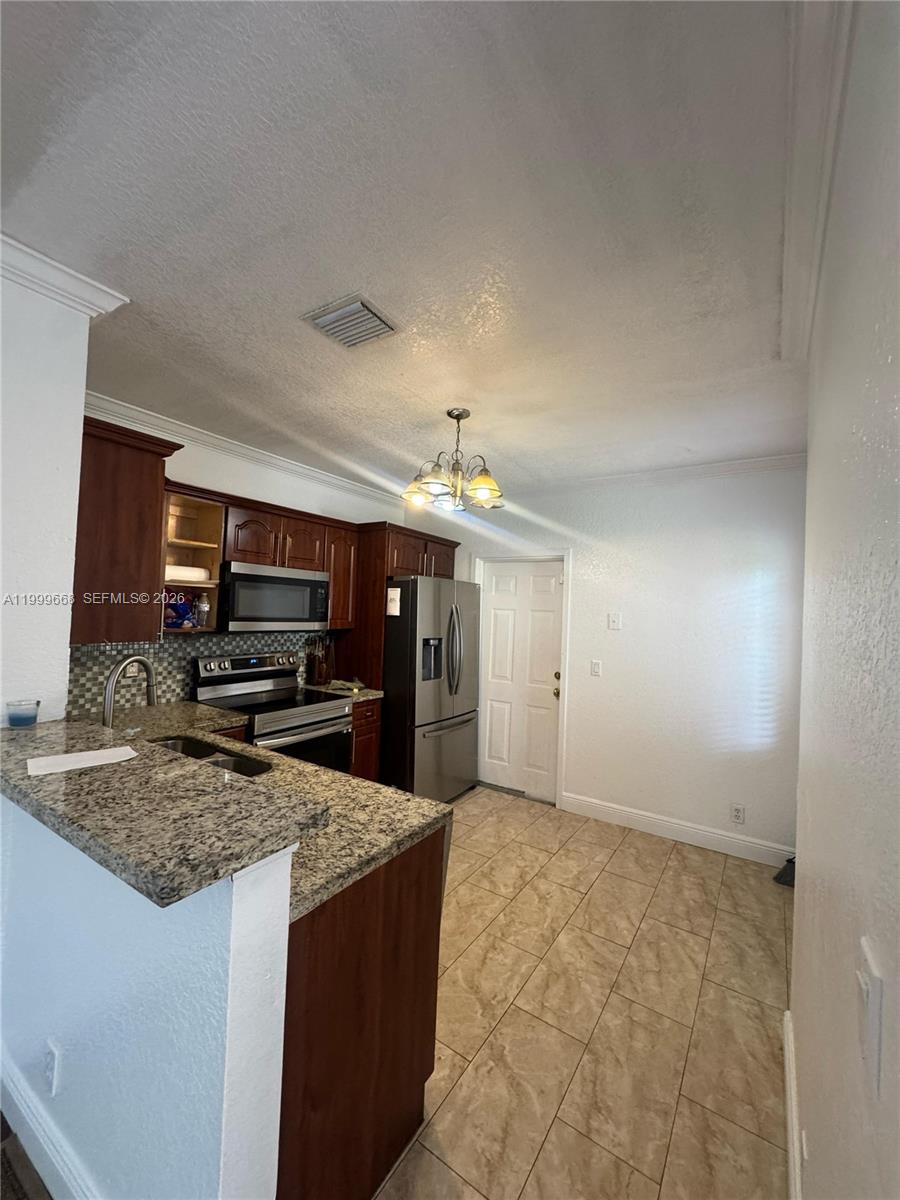 TAMARAC ISLAND CONDOMINIU - Residential