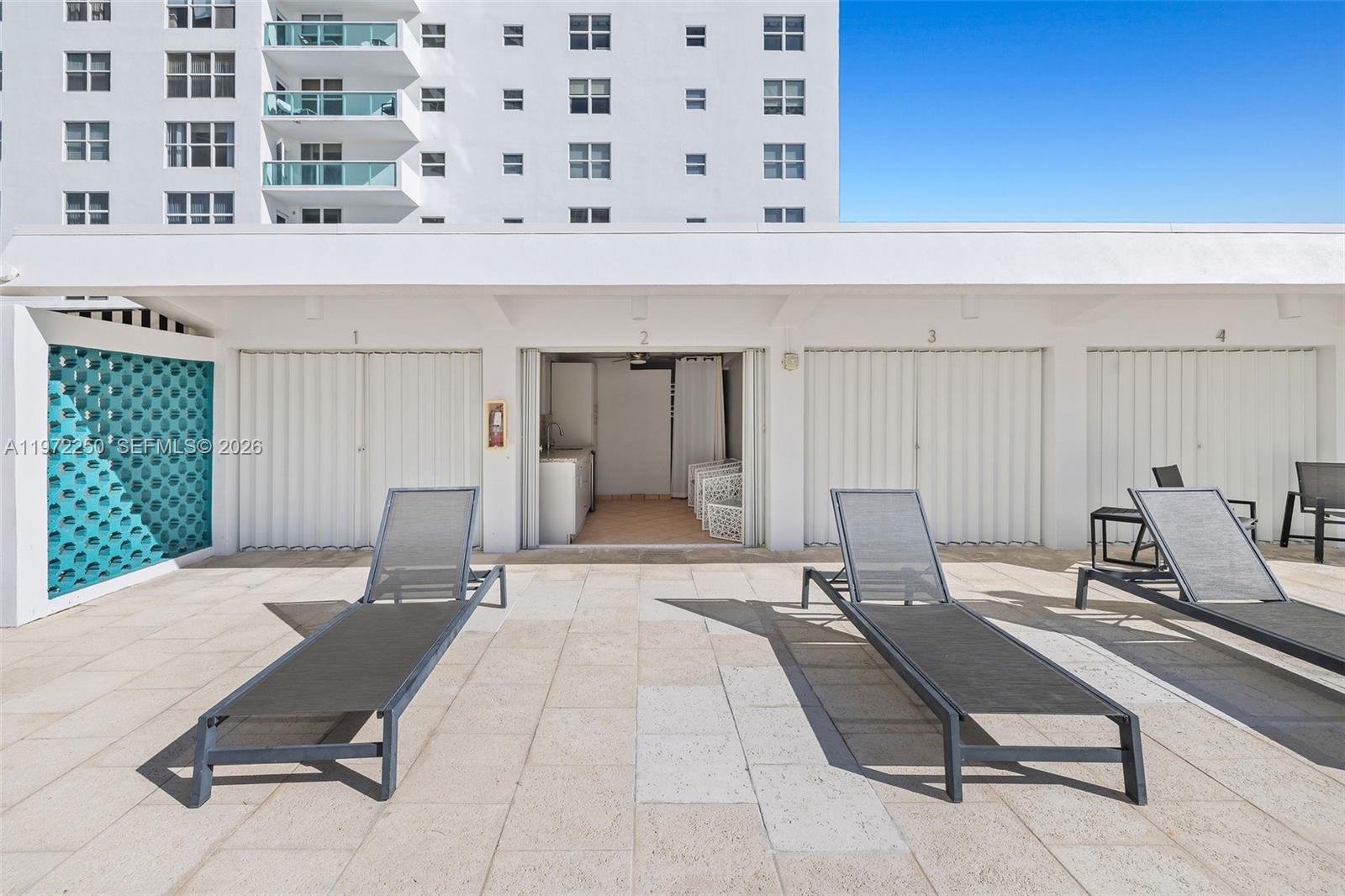 Rare opportunity to own a private cabana at the Executive Condominium. Just steps from the pool and Miami Beach, this cabana features a living area with built-in storage, sink, and dishwasher along with a full shower. A convenient and comfortable retreat by the beach. Available exclusively to Executive Condominium owners.