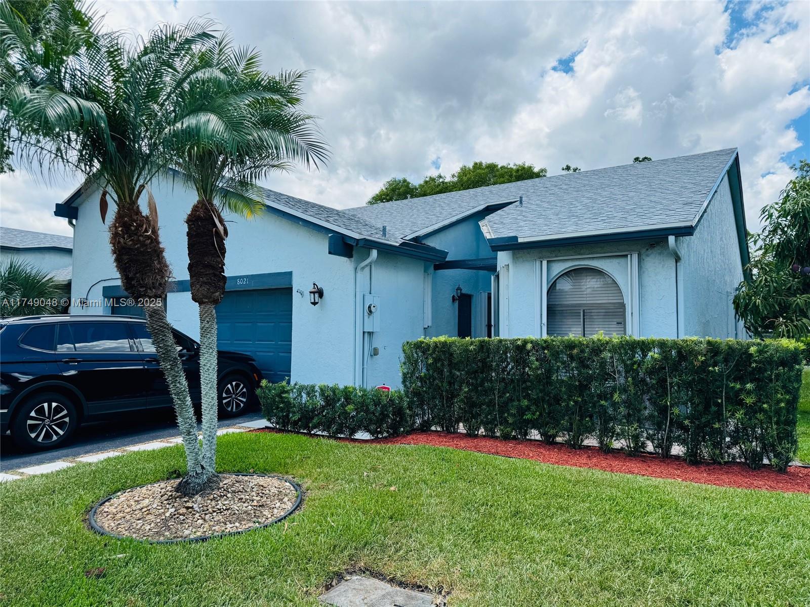 All Renovated!!! You have found the perfect large corner villa in Spring Lake Villas. This Gorgeous 2 bedrooms and 2 bathrooms plus garage that have been converted into a third bedroom with a walking closet. Open floor plan with modern kitchen with peninsula good for entertaining, eating or cooking, sleek stainless steels appliances, quartz countertops and beautiful back splash, plenty of cabinets with pull out pantry a lot of drawers deep enough for pots, Master bathroom have been tastefully updated, his and her walking closet. Vaulted ceiling with recessed LED lights, waterproof laminated floors, accordion shutters, retractable patio awning. Roof and exterior paint done in 2022. Low HOA cover exterior insurance, roof, pool services, sprinkler, landscaping and Close to parks.