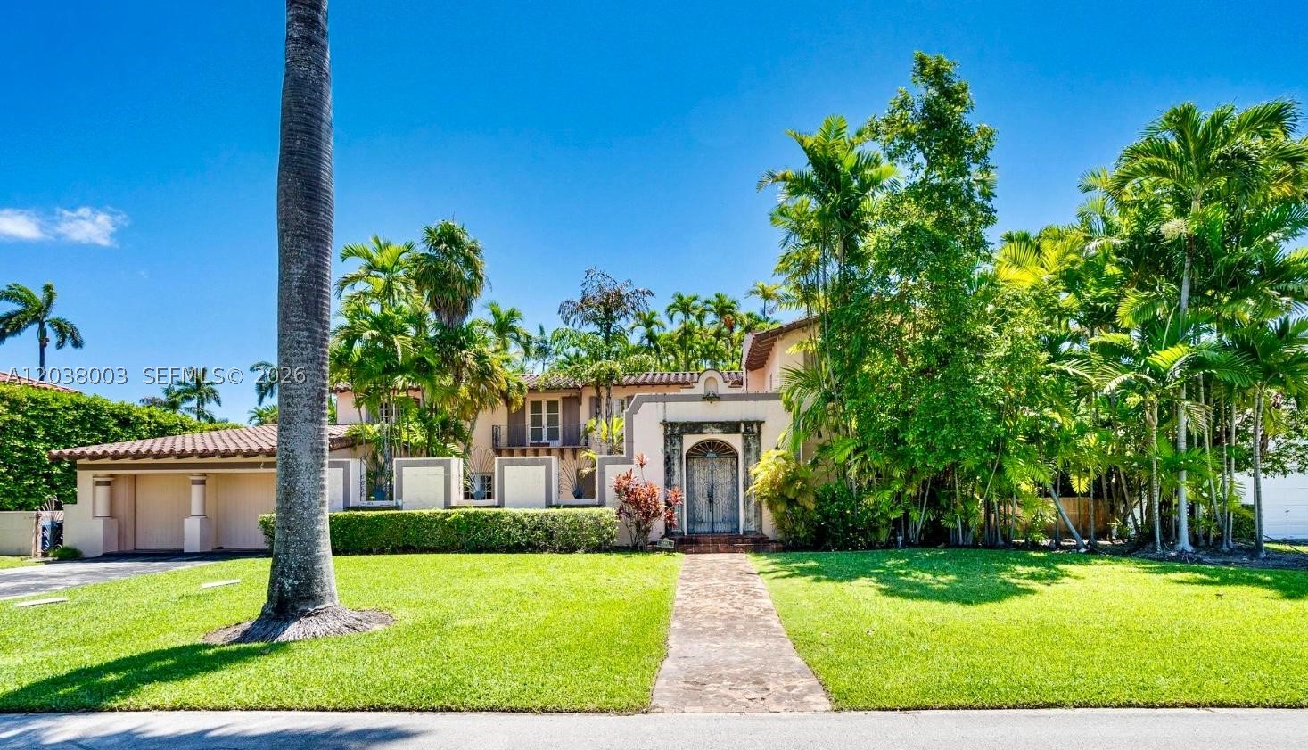 Awaken sleeping beauty or create your own fairytale. Redefine this 1937 classic with its tall windows and French doors, all awash in natural light. Create magic in the grand courtyard with its Juliet balcony, decorative stonework, custom wrought iron and thick columns that add gravitas as you enter this estate. Enjoy elegantly formal rooms, picturesque outdoor terraced patio with fountain and a two-car garage. Or… build a new custom home in this coveted location. Live life in the sunshine on this 24-hour guard-gated Island. This lush, leafy neighborhood is surrounded by Biscayne Bay, mere minutes from the ocean and the La Gorce Country Club. An additional 24-hour marine security patrol ensures the tranquility of this supreme Miami Beach location.