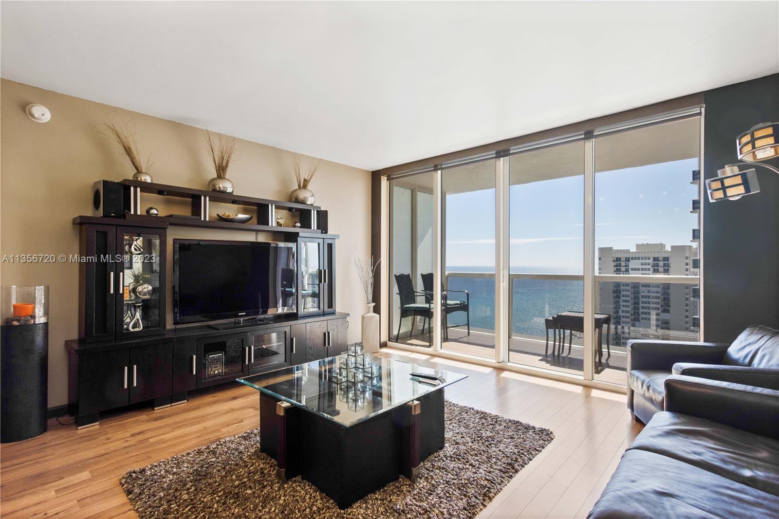 Breathtaking ocean views from this 21st floor studio apartment with queen bed. This exquisite unit offers an euro style kitchen with stainless steel appliances, granite counter-tops and large terrace. Amenities include state of the art fitness center, 3 resort style pools, full spa service spa, business center, conference rooms, billiard room, party room, restaurant, 24 hr. valet, concierge, beach service, covered parking and 24 hr. security.