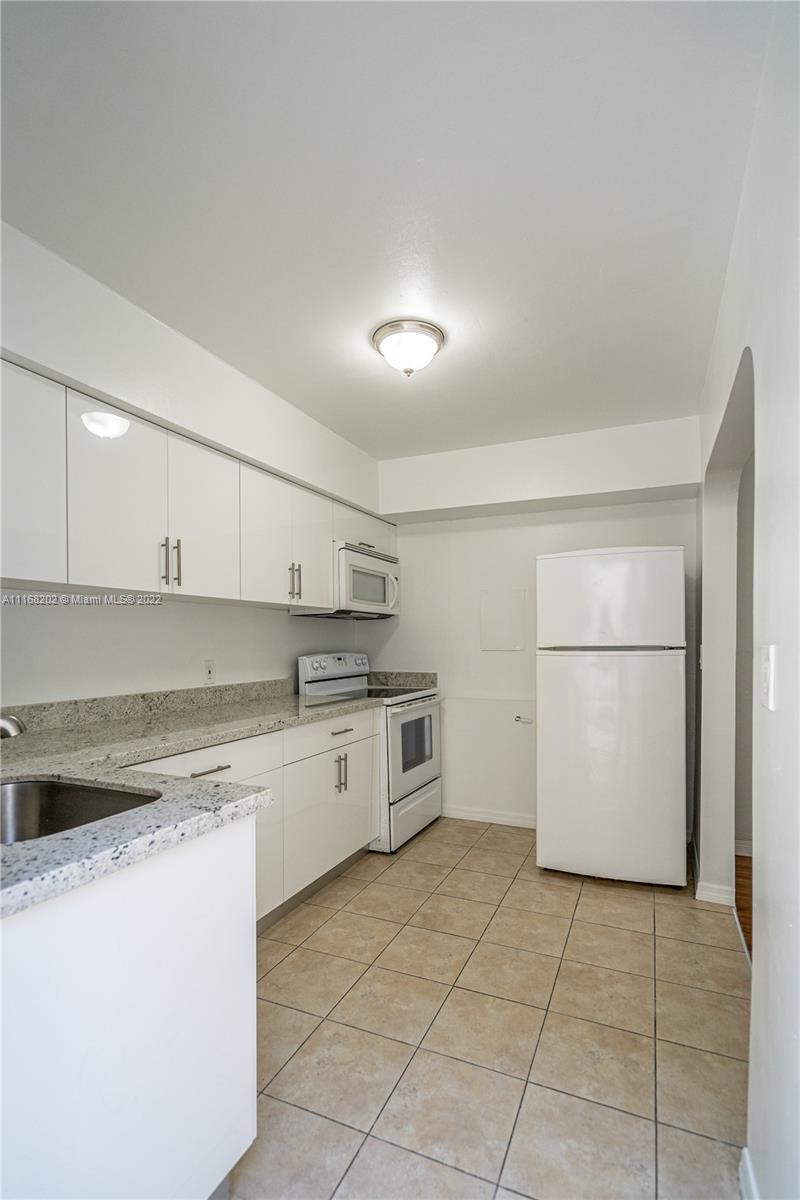 7711 DICKENS AVE CONDO - Residential Lease