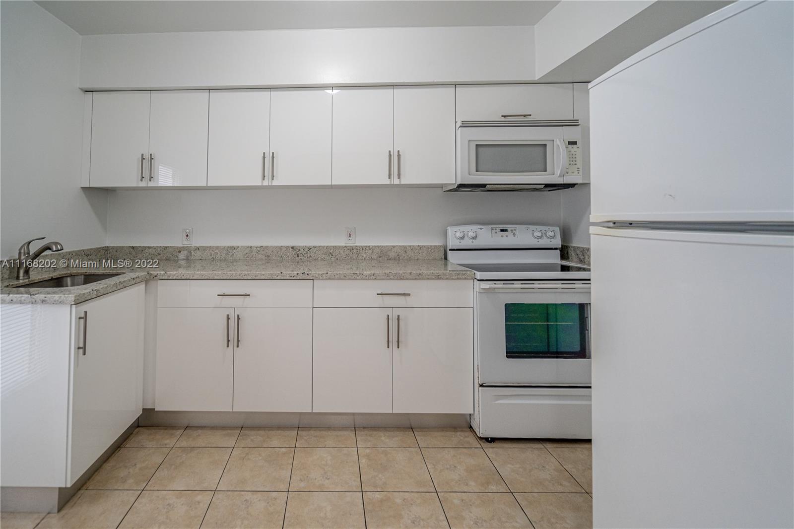 7711 DICKENS AVE CONDO - Residential Lease