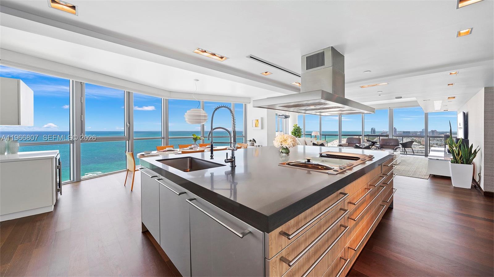 Experience unparalleled luxury in this stunning 3-bedroom, 3-bathroom penthouse at The Setai, one of the most desirable addresses in Miami Beach. Featuring elegant all-wood floors throughout and top-of-the-line Gaggenau appliances, this residence blends sleek design with modern functionality. Floor-to-ceiling windows capture breathtaking direct ocean views, filling the interiors with natural light and highlighting the beauty of oceanfront living. Every detail has been thoughtfully curated to create a seamless balance of comfort, sophistication, and timeless elegance. At the iconic Setai, residents enjoy world-class amenities, including five-star concierge service, three oceanfront pools, a renowned spa, and award-winning dining—all in the vibrant heart of South Beach.