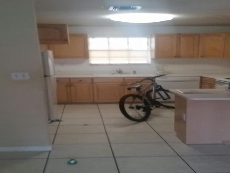 Available now, spacious 3 bedroom,2 bath, freshly painted, tiled throughout washer/dryer. Centrally located.