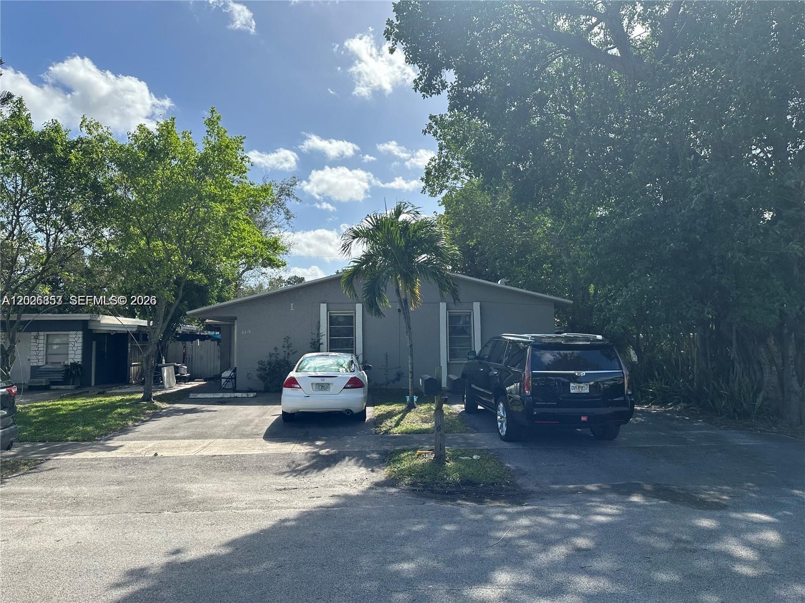 PRICED TO SELL! This property is close to the Florida Turnpike, McArthur High School, and the iconic Hard Rock Guitar. Each duplex comes with two parking spaces. The 1st unit has 2-B/R & 2-Bathroom , The 2nd unit is a 3-B/R & 2-bathroom . Both units have their own laundry rooms. Each unit is metered for separate water and electricity. Central A/C . Tile flooring with updated bathrooms and kitchens. The roof, installed with proper permits on 6/3/2019, is in great condition. The unit with 3/2 is currently listed for rent for $2950 which is lower than the market rate & 2/2 is currently rented for $1900.00 (Can raise up to $2500.) Don't miss out on buying this amazing duplex!
