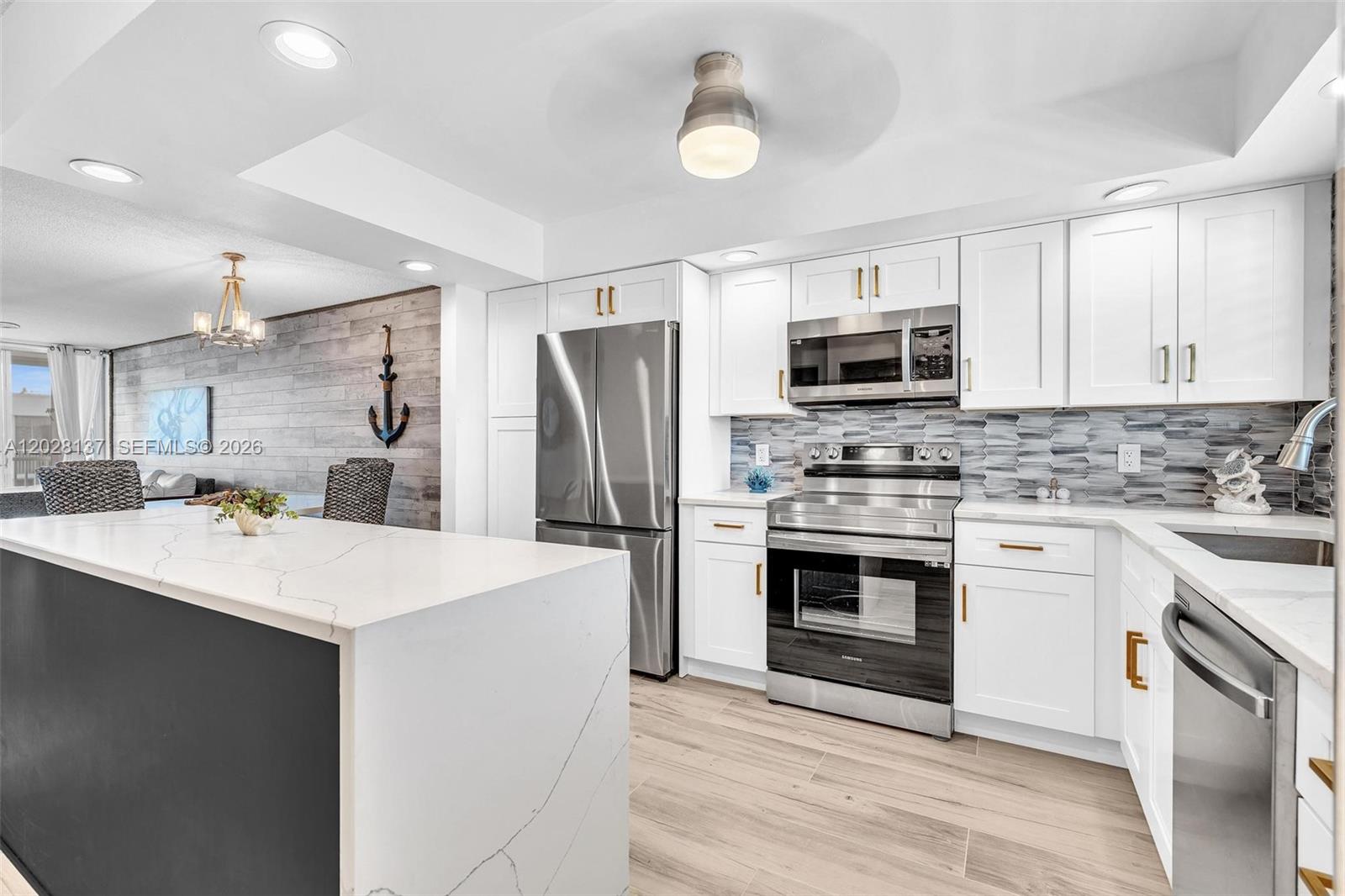 TRULY TURNKEY AND MOVE-IN READY! ALL ASSESSMENTS PAID IN FULL! This beautifully renovated and fully furnished condo offers a rare opportunity to enjoy a completely updated home without the time, expense, or hassle of renovations and furnishing. Features include impact windows, new A/C, new water heater, newer Samsung stainless steel appliances, porcelain wood-look tile flooring throughout, updated kitchen and baths with Shaker cabinets and quartz countertops, designer lighting, upgraded doors and hardware, and a stylish shiplap accent wall.
Seller has paid all assessments in full, providing peace of mind for the new owner. Offered fully furnished with high-quality imported furniture, this home is truly move-in ready, just bring your suitcase. The spacious primary suite features a king-size bed, while the guest bedroom includes a queen-size bed. Furniture inventory available upon request. Seller may consider a price adjustment if purchased unfurnished. Located on the 4th floor with convenient elevator access. One assigned parking space and ample guest parking. Rentals permitted after two years of ownership. Enjoy the active South Florida lifestyle in this desirable 55+ community, ideally located near shopping, dining, golf courses, marinas, beaches, and the Intracoastal Waterway. A rare opportunity to own a fully updated, furnished home with nothing left to do but move in and enjoy.