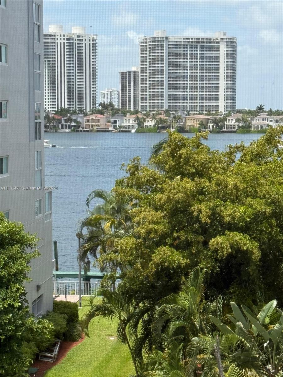 Stunning, Fully Renovated 2-Bed/2-Bath Condo with Bay Views in Sunny Isles Beach! Fall in love with this bright and stylish residence at the boutique Le Frontenac. Featuring a modern split floor plan, in-unit washer & dryer, sleek finishes throughout, and a private balcony with partial bay views, this home is being offered fully furnished with contemporary décor just bring your suitcase! The building offers secure gated entry, a sparkling pool, relaxing hot tub, and covered assigned parking all in a peaceful, low-rise community. Perfectly situated in the heart of Sunny Isles, you’ll be just steps from the beach, supermarkets, restaurants, shops, parks, and top-rated schools