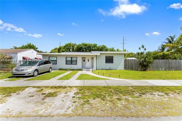3-bedroom, 2-bathroom home in the heart of Hollywood, just minutes from the beach, shopping, and dining.  Situated on a spacious corner double lot, this property is perfect for entertaining and outdoor living with a private, fully fenced yard offering both space and privacy. Move-in ready and waiting for its new owner