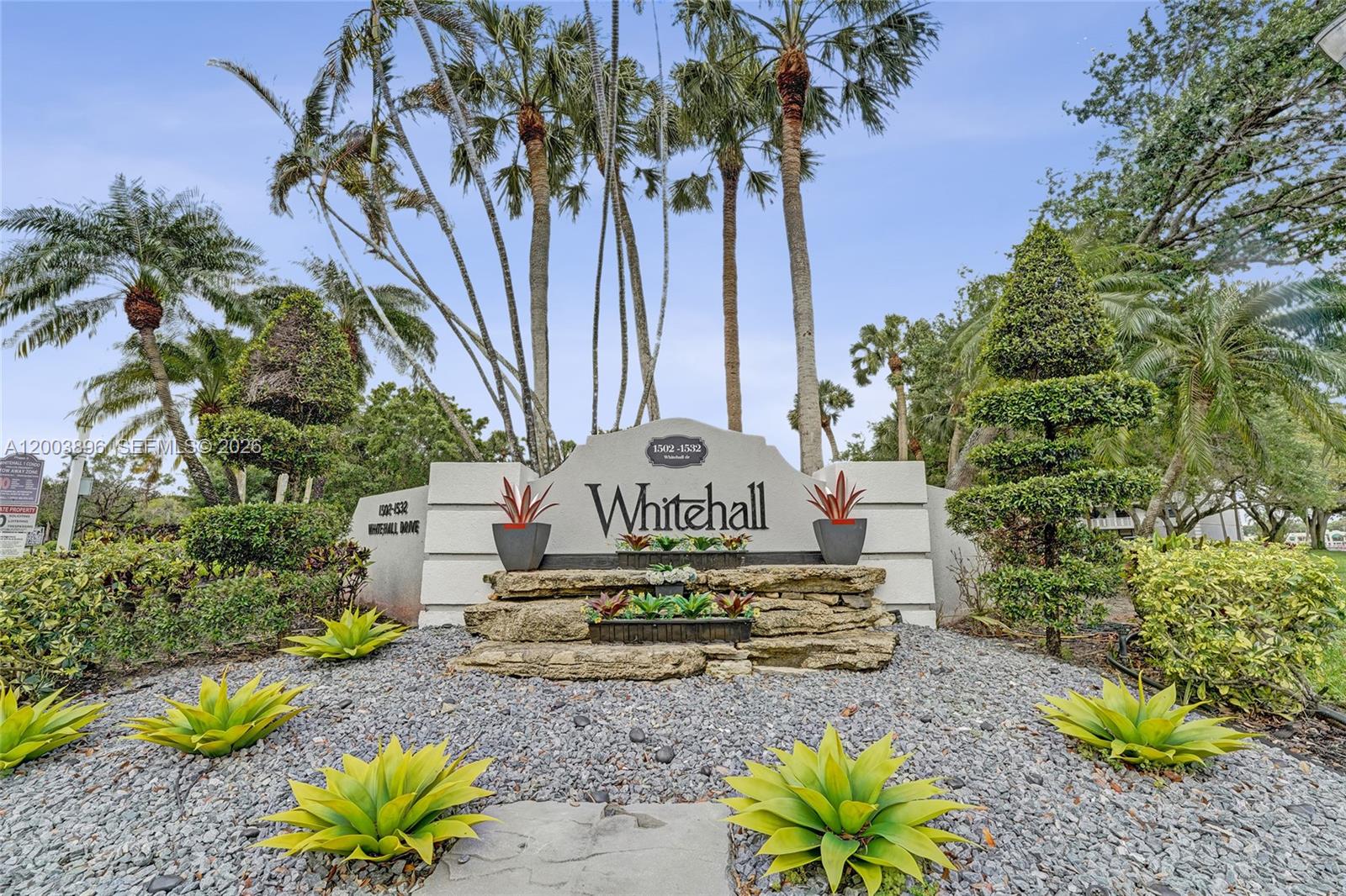 This 2 bedroom 2 bathroom 3rd floor condo on the water is located in Whitehall 1 which is located in a private country club community of Pine Island Ridge!  This all age community features 1,385 square feet of luxury living with a full size washer/dryer, large storage room off utility room which can be used as a 3rd room (fits double bed and end table), office, or den.  Walking distance to community pool, shopping, banks, restaurants and much more!  The country club features a pool, tennis and pickle ball courts, 2 restaurants, a full gym and card rooms!  Association states no renting for the first two years after purchasing, no commercial vehicles, and no fannie mae mortgages.  One reserved parking spot with plenty of guest spaces!